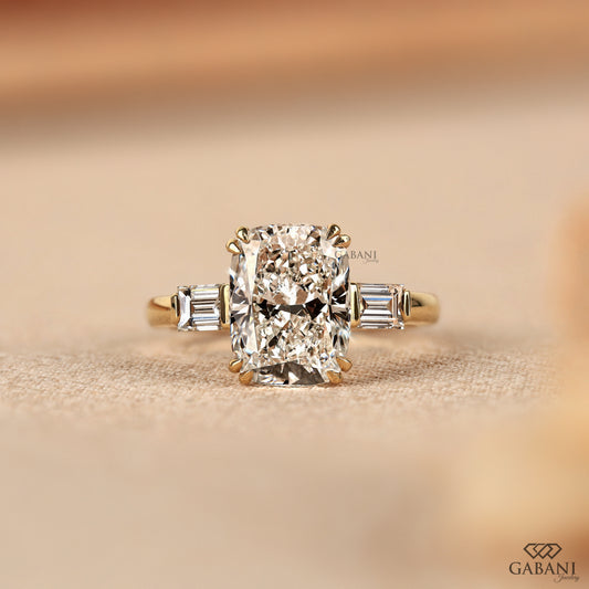 Elongated cushion cut lab grown diamond three stone engagement ring in solid yellow gold