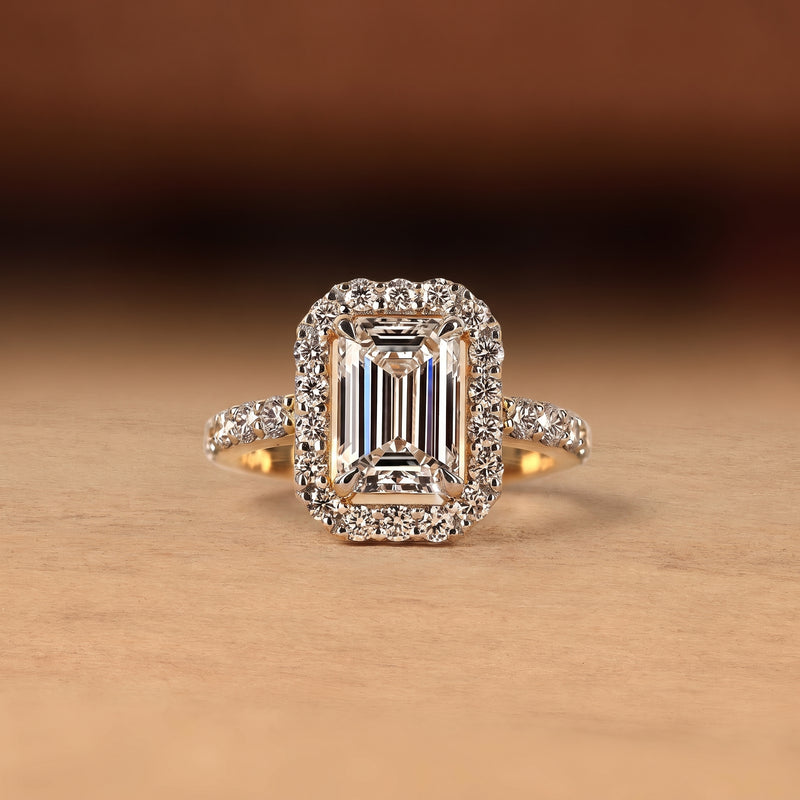 Emerald Cut Diamond Halo Engagement Ring with Pave Diamond Band
