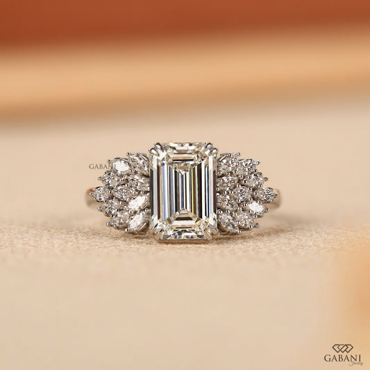emerald cut lab grown diamond engagement ring with marquise side stones in 14k white gold