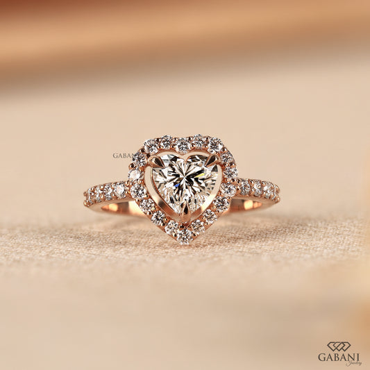 made by Gabani Jewelry heart cut lab grown diamond halo ring in 14k rose gold with pavé setting