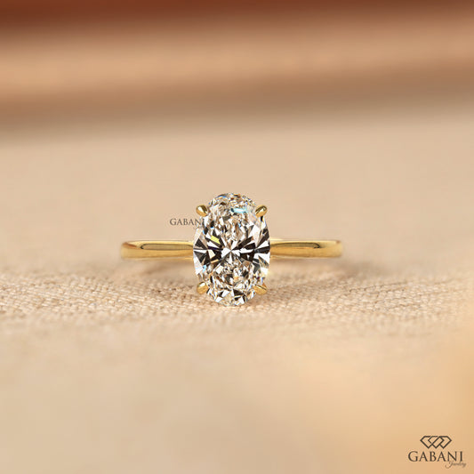 oval cut lab grown diamond solitaire ring with tulip basket and notch setting, low profile design with clean polished finish