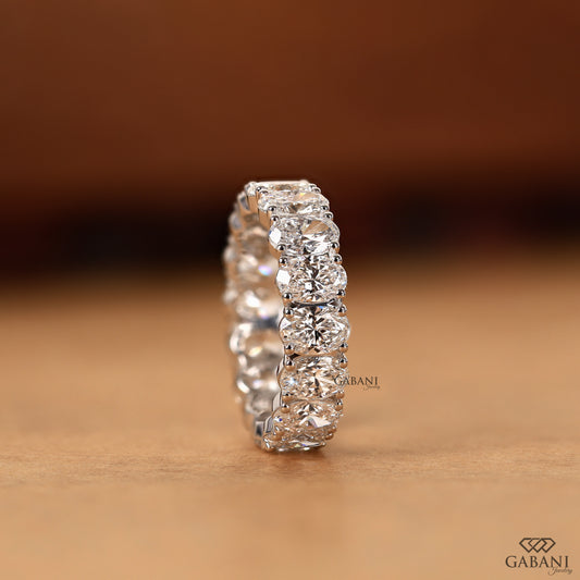 oval cut lab grown diamond eternity wedding band in white gold wide chunky band
