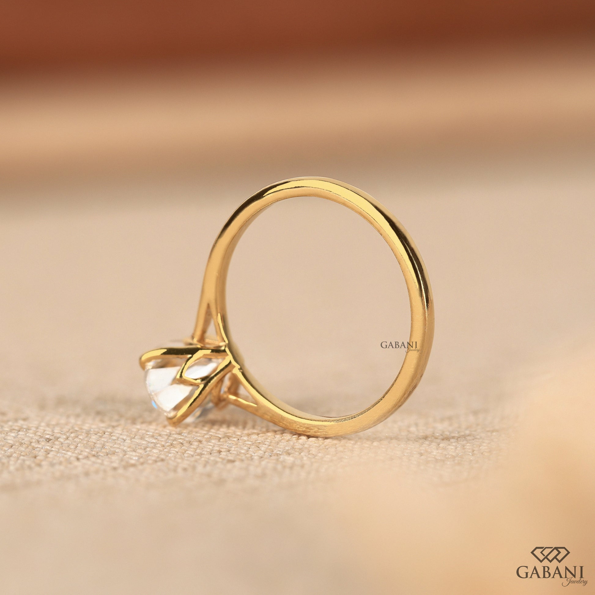 oval lab grown diamond solitaire ring designed with tulip basket setting for balanced light and security