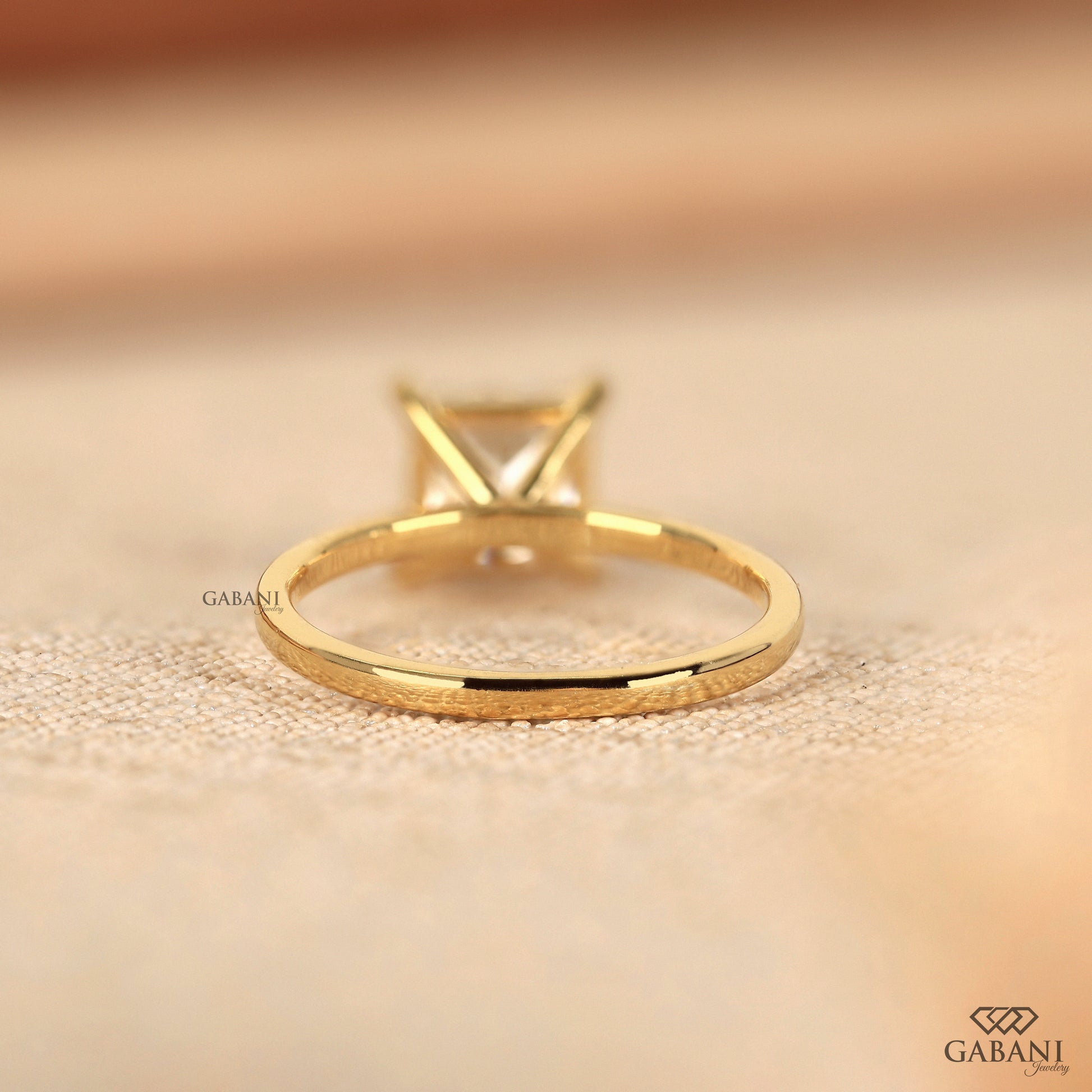 Square lab grown diamond ring in yellow gold with classic prong setting