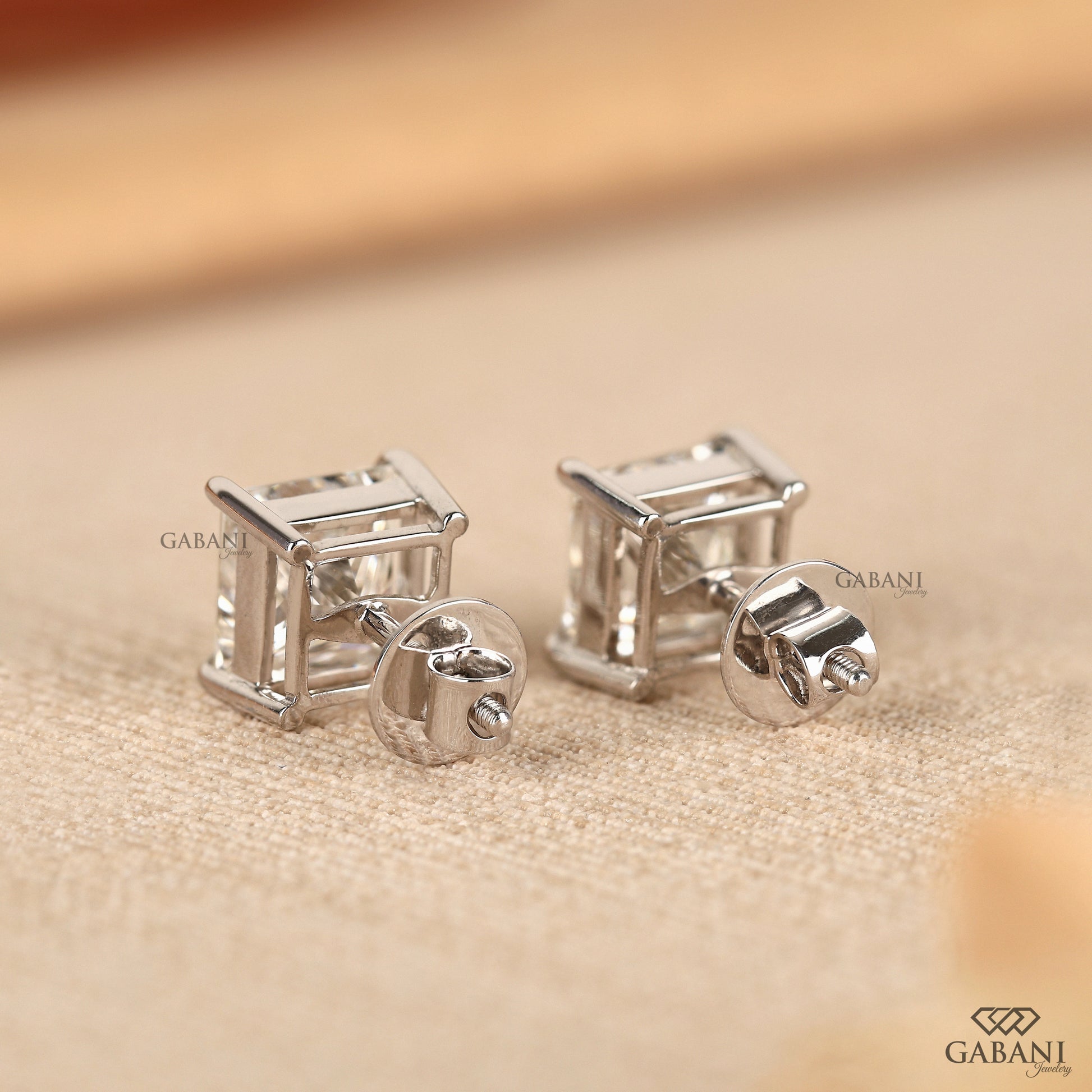 Princess cut lab diamond studs with claw prong setting

