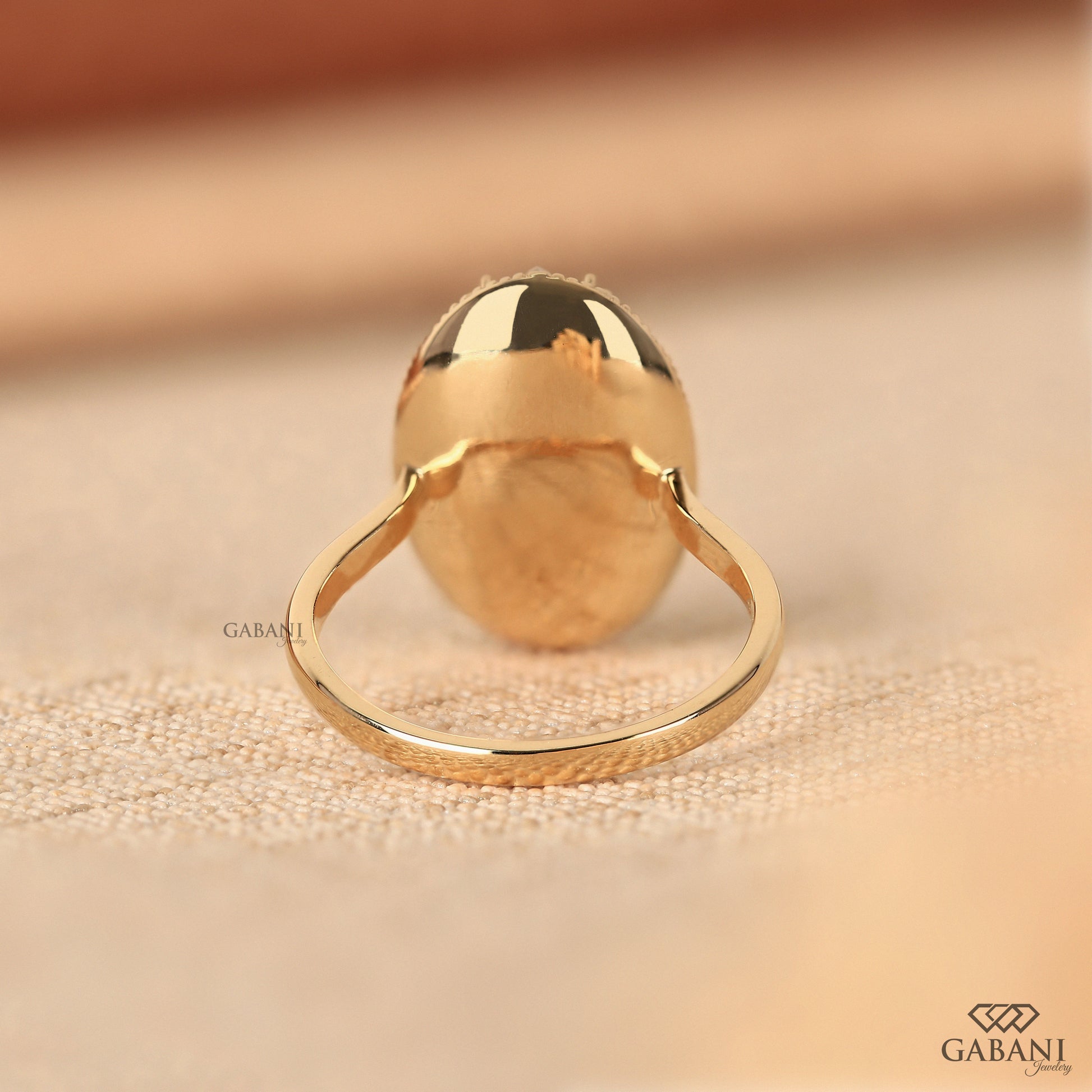 Oval lab grown diamond mosaic ring with milgrain detailing
