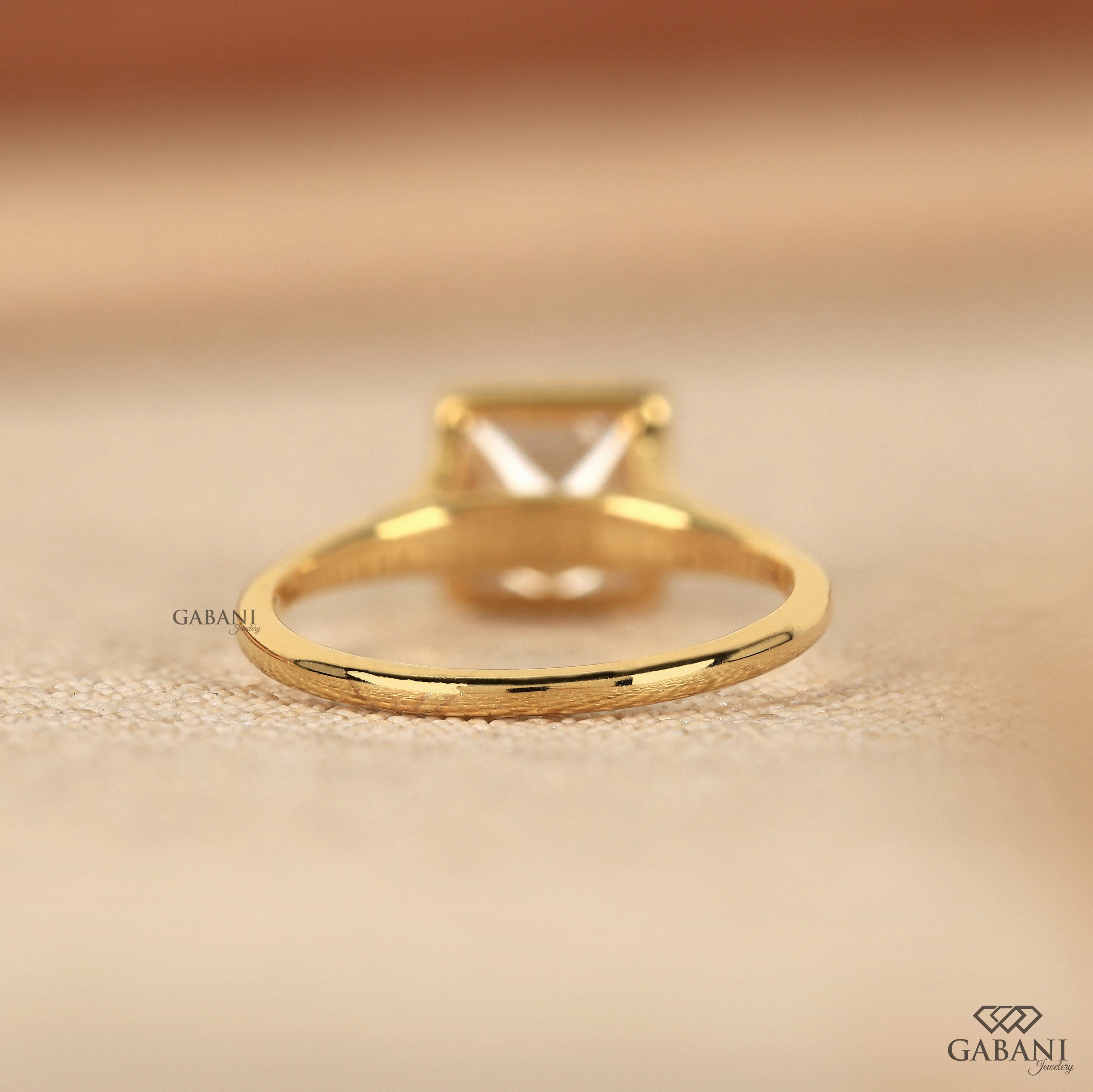 princess cut lab grown diamond engagement ring in 18K yellow gold with a full bezel setting