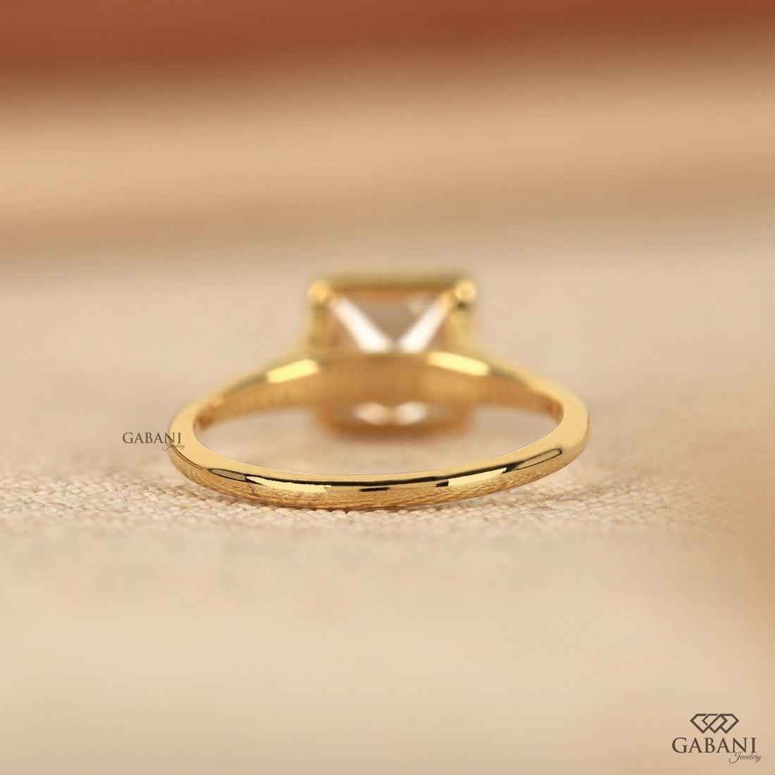 princess cut lab grown diamond engagement ring in 18K yellow gold with a full bezel setting