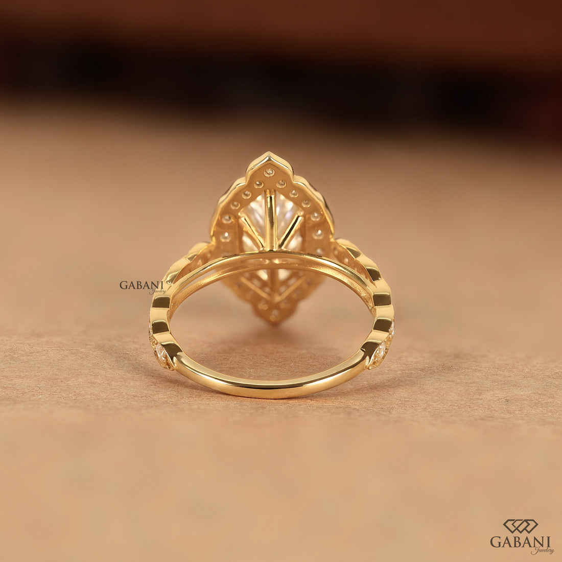 Marquise diamond ring with lab grown center stone and pave band