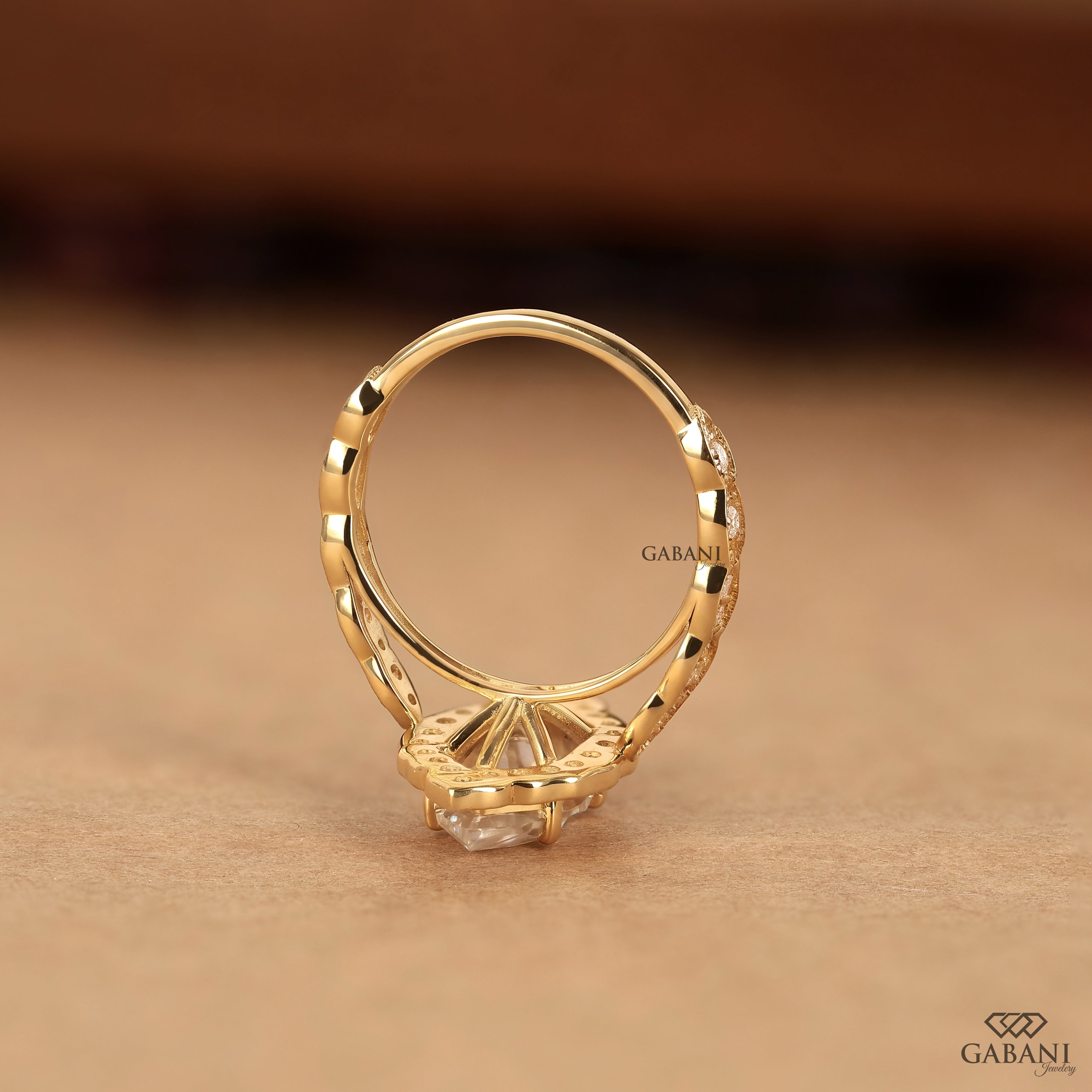 Marquise cut lab grown diamond proposal ring with halo setting