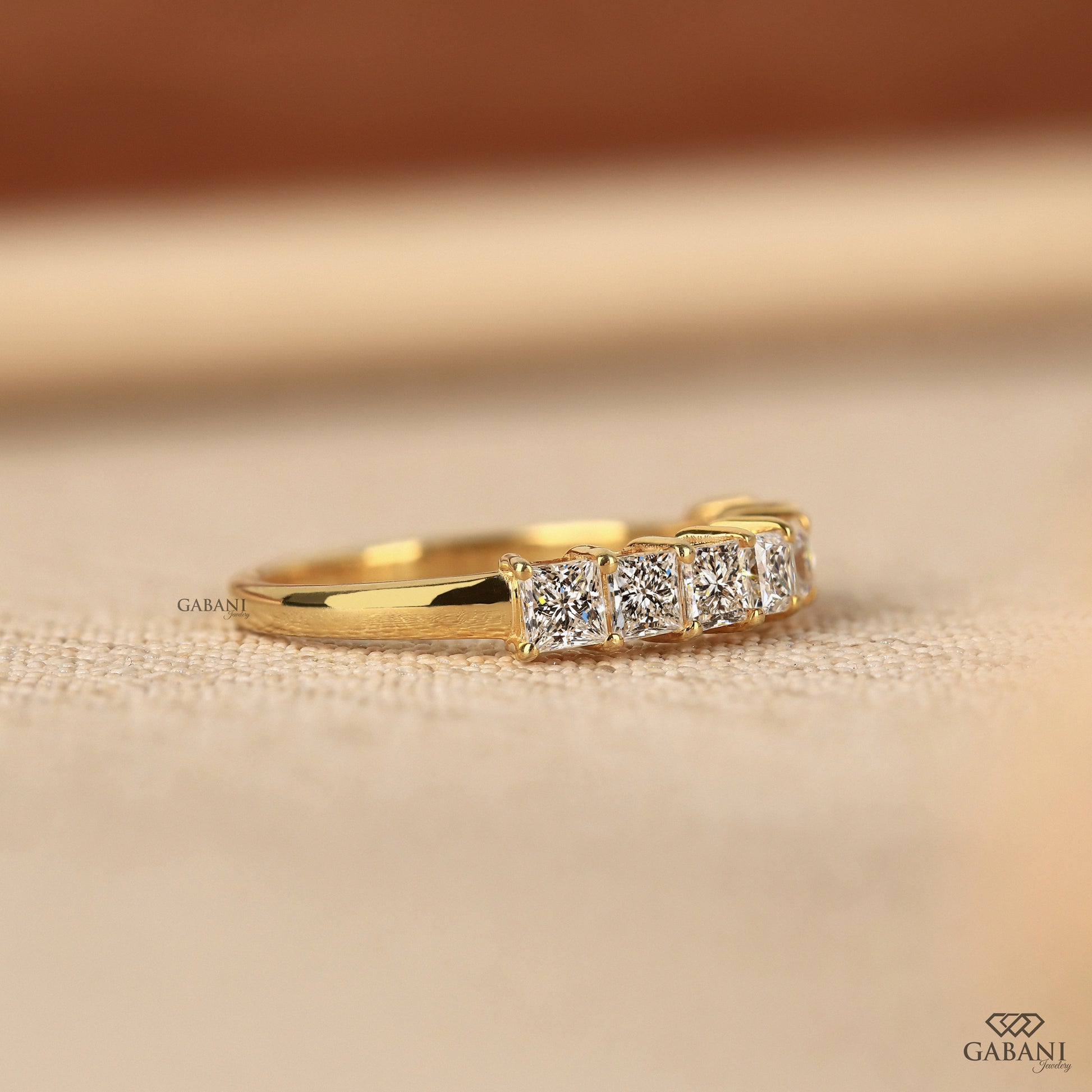 Comfort fit half eternity band with princess cut lab grown diamonds
