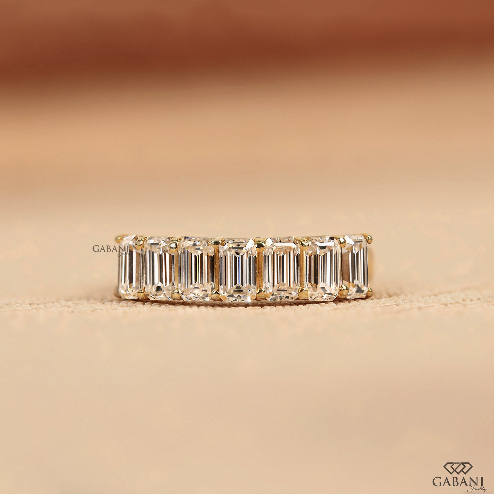 Emerald cut lab grown diamond 7 stone wedding band in solid yellow gold