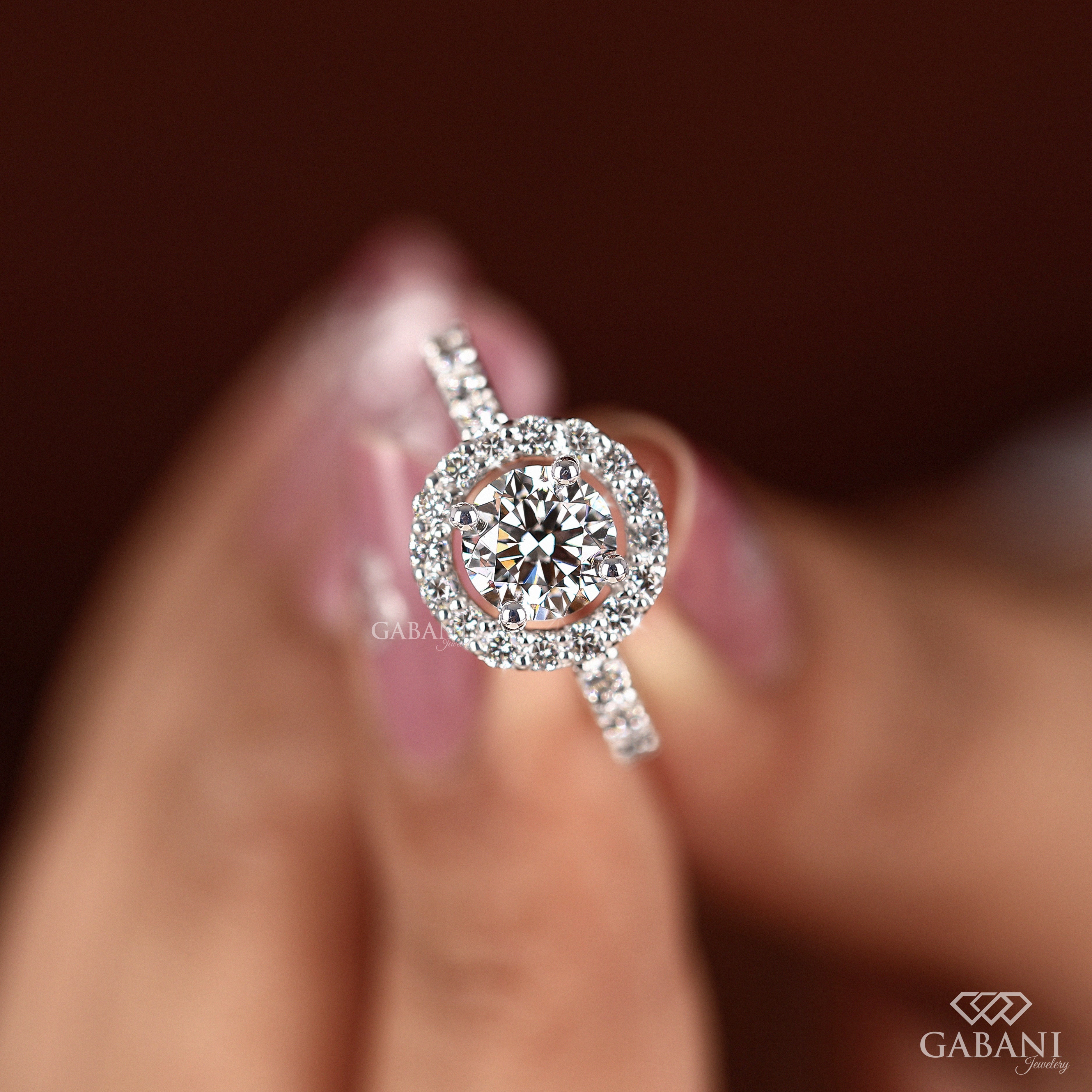 Round cut lab grown diamond halo engagement ring with pave diamond band, yellow gold setting, IGI certified EF color VS1 clarity.