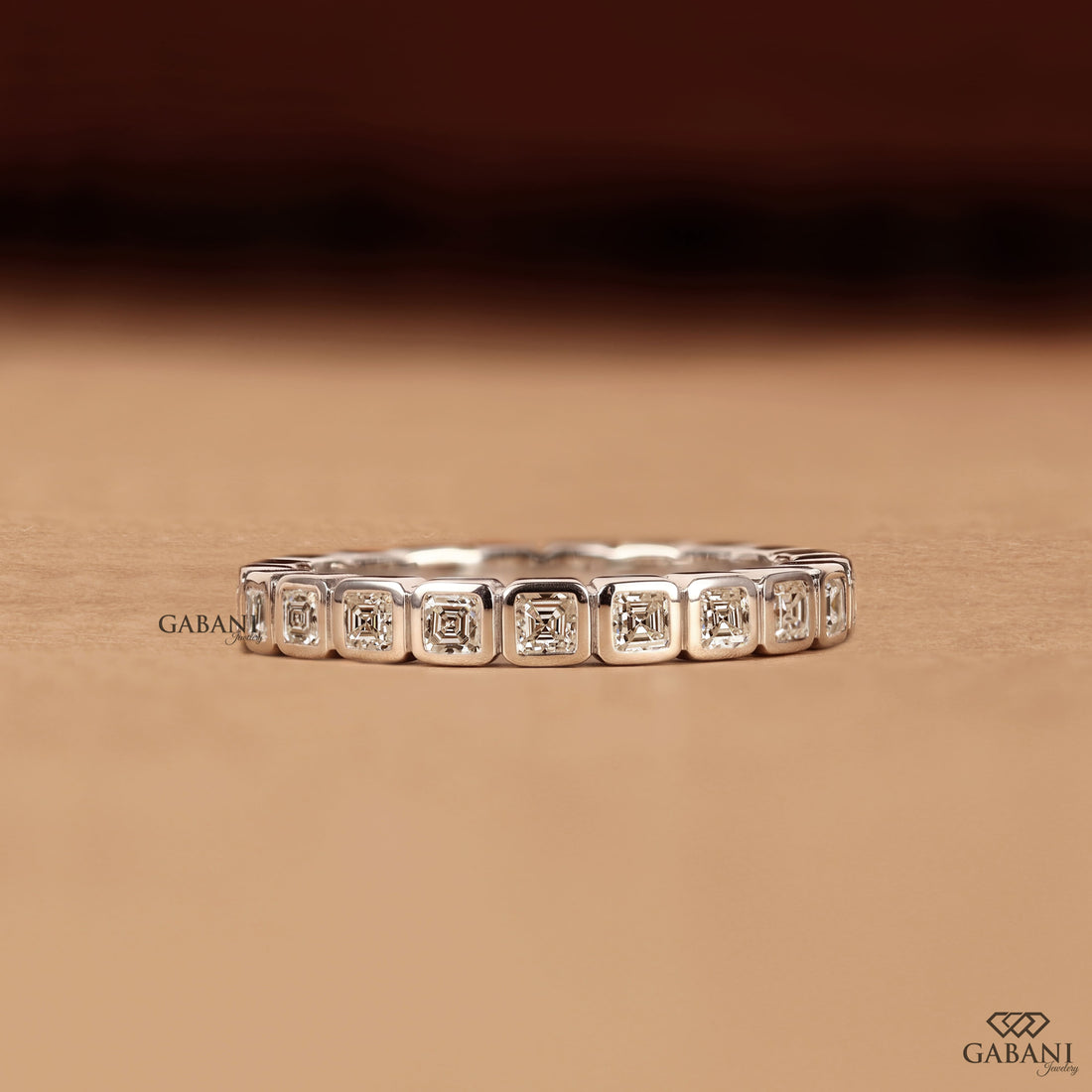 Asscher cut lab grown diamond full eternity band in white gold with bezel set EF color VS1 clarity diamonds, designed as a wedding, anniversary, bridal, or stackable ring.