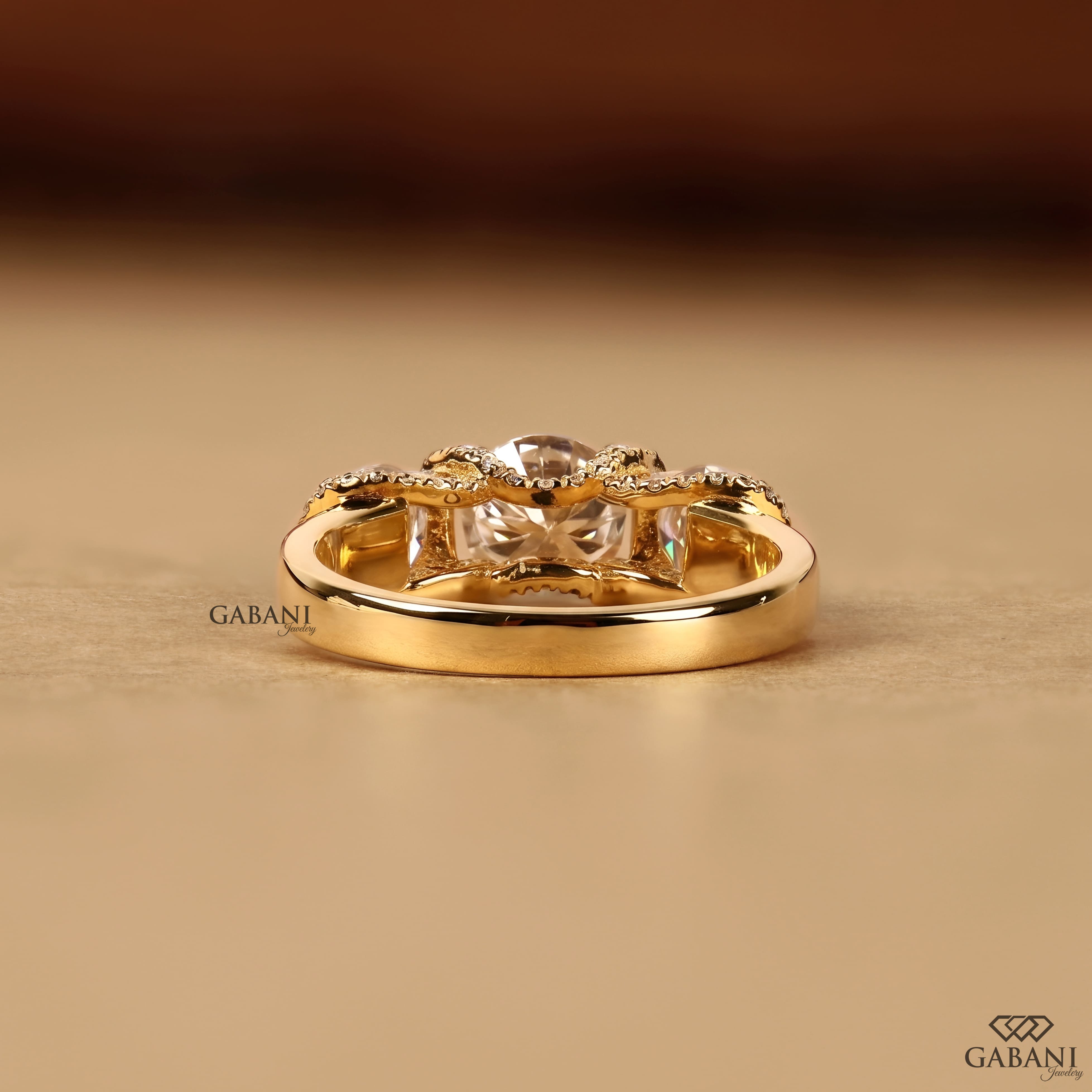 1.5 to 2 carat lab grown diamond engagement ring with cushion and pear cuts