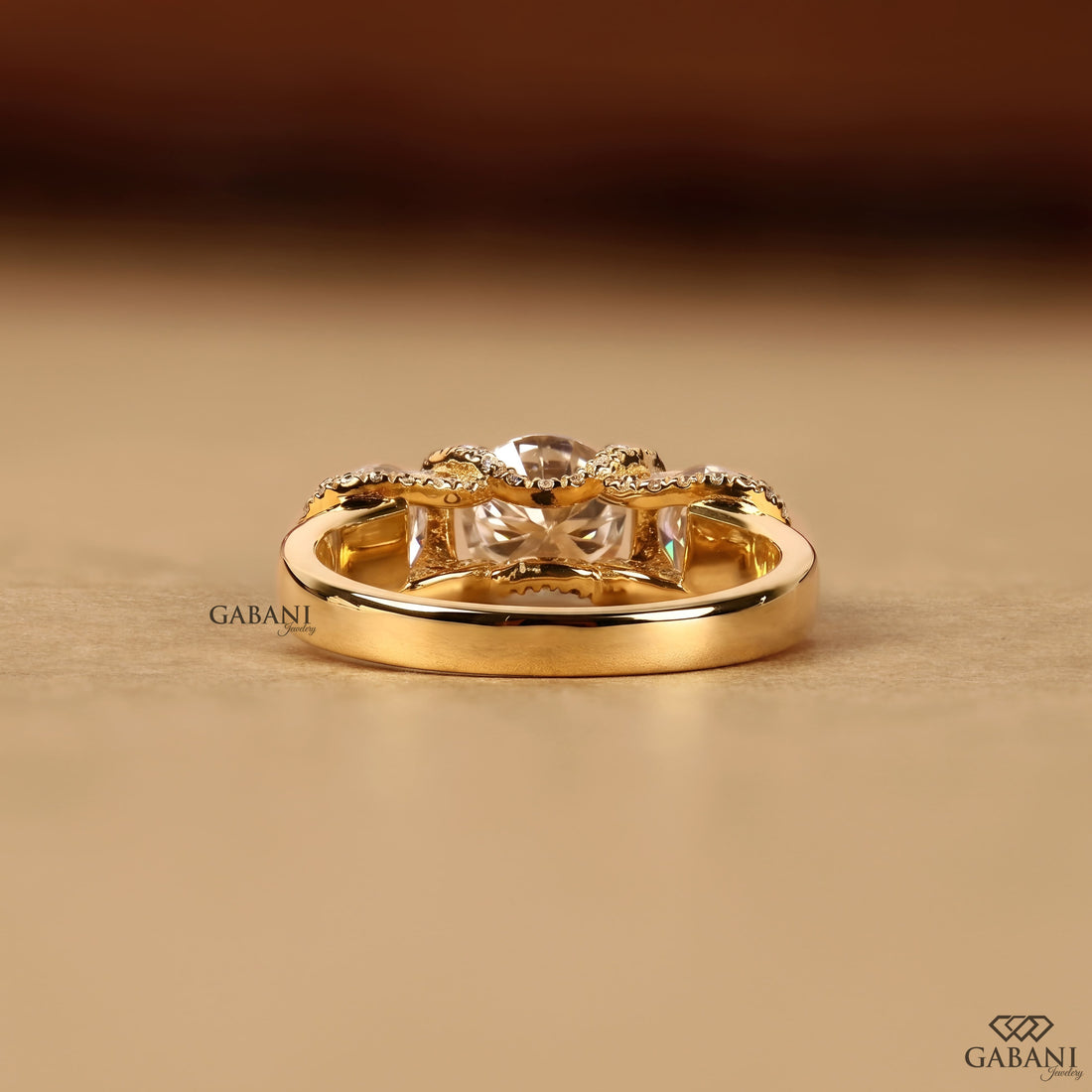 1.5 to 2 carat lab grown diamond engagement ring with cushion and pear cuts