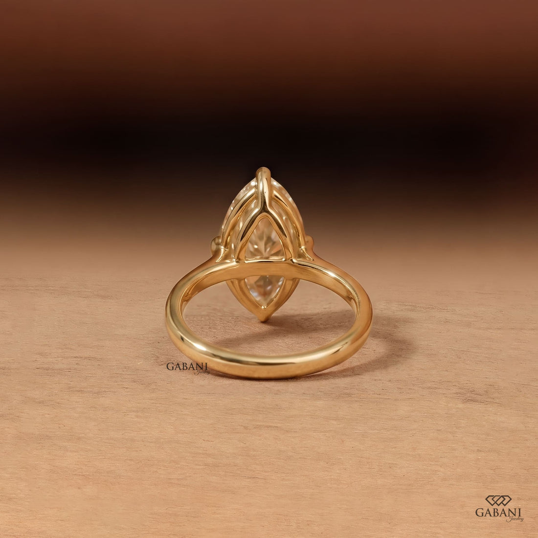 Oval old mine cut lab grown diamond engagement ring in 18K yellow gold with antique-style faceting, claw prong setting and polished solitaire band.