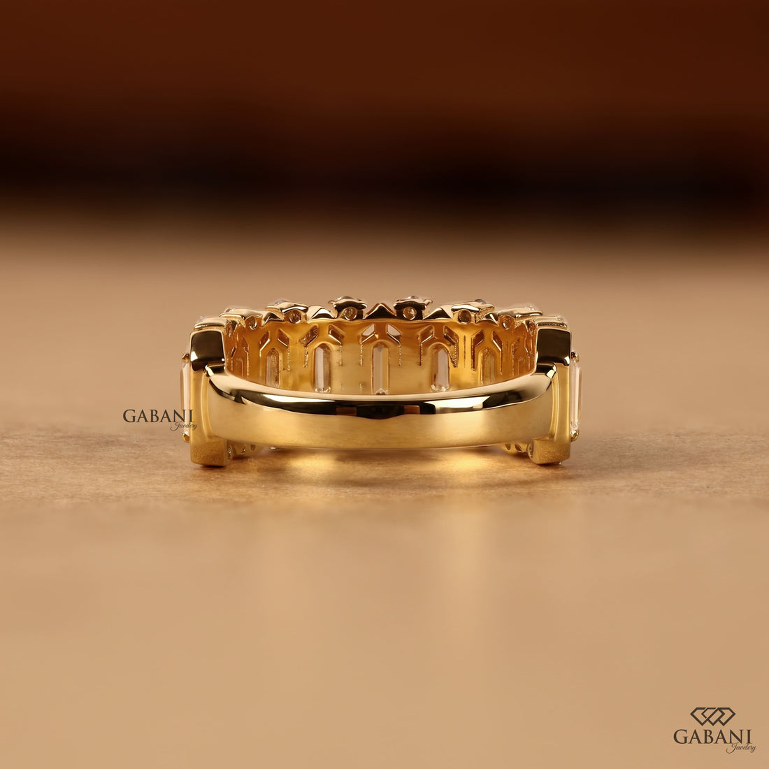 Emerald cut lab grown diamond wedding band in yellow gold with round diamond accents and a bold geometric design for bridal, anniversary, and statement wear.