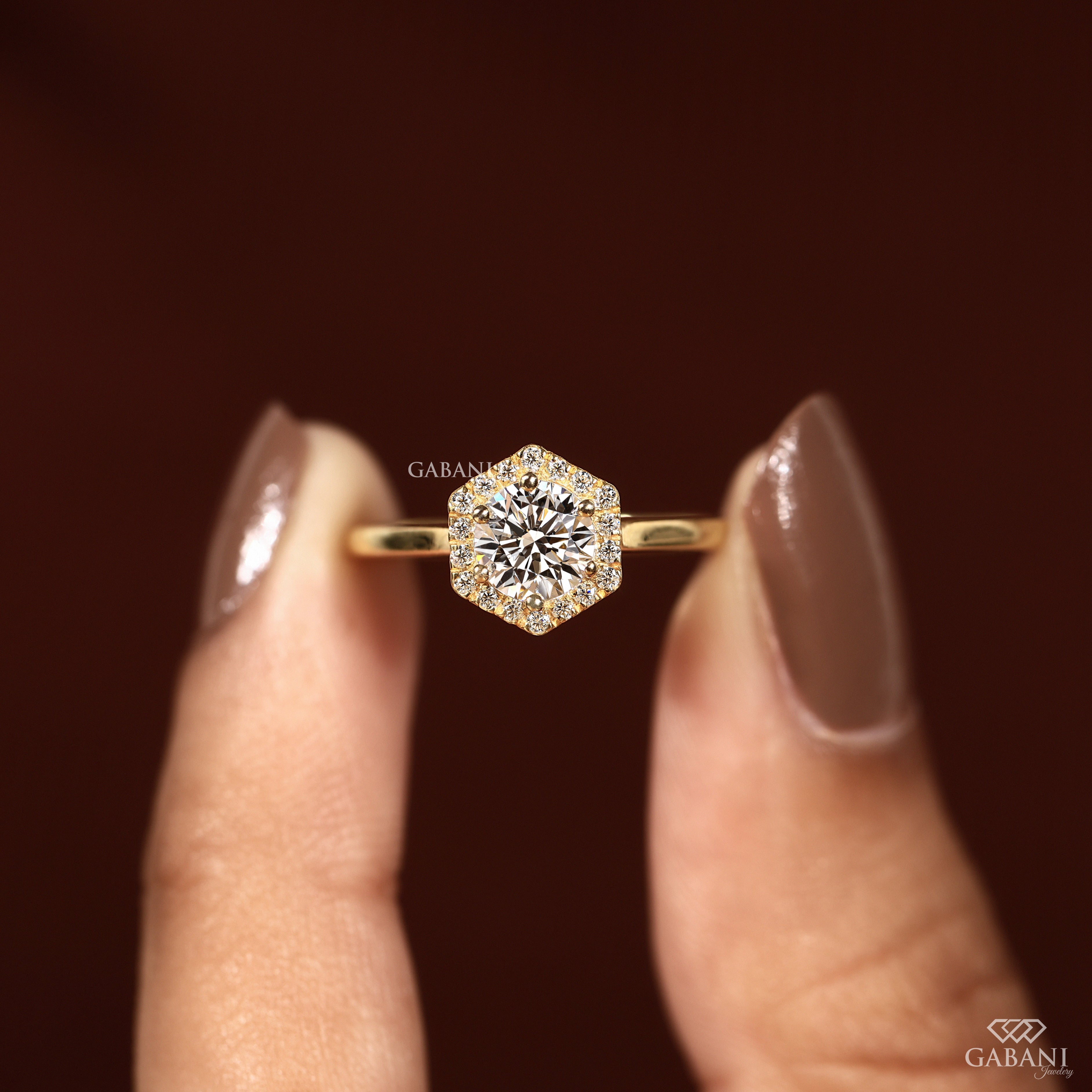 Round cut lab grown diamond engagement ring with hexagon halo, yellow gold band, IGI certified EF color and VS1 clarity.