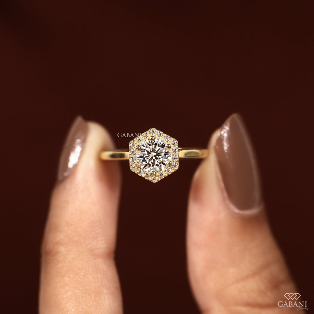 Round cut lab grown diamond engagement ring with hexagon halo, yellow gold band, IGI certified EF color and VS1 clarity.
