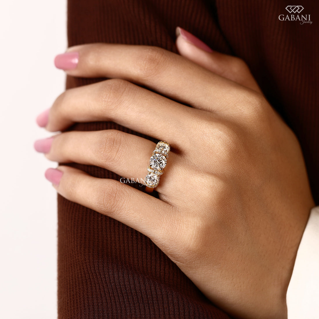 1.5 to 2 carat lab grown diamond engagement ring with cushion and pear cuts