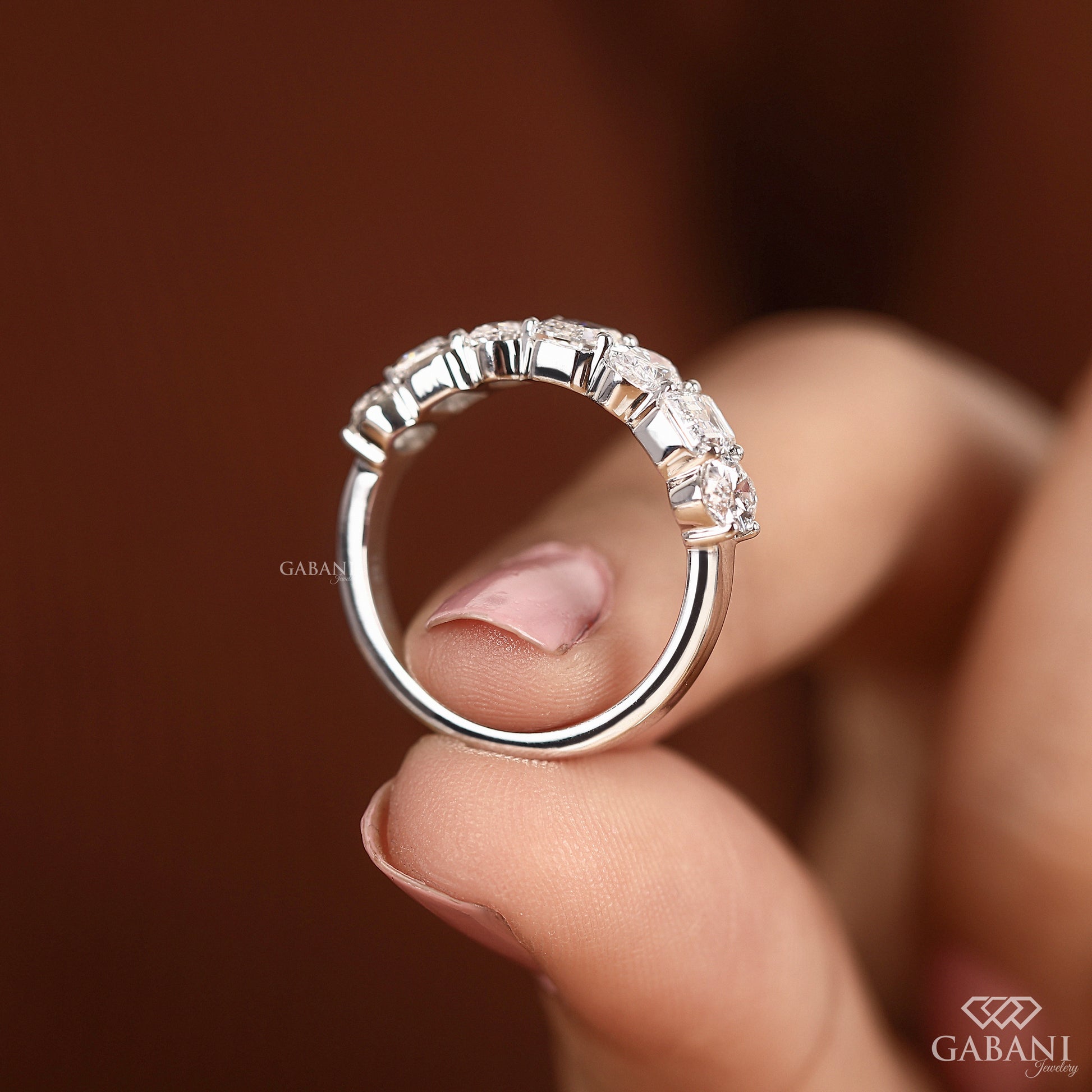 comfort fit white gold wedding band with oval and emerald lab grown diamonds