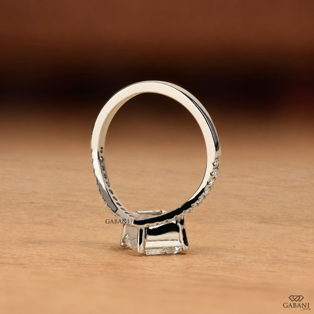 Princess cut lab grown diamond engagement ring in white gold with a kite set center stone and round pave diamond accents on a cathedral style band, designed for engagement, bridal, proposal, or anniversary wear.