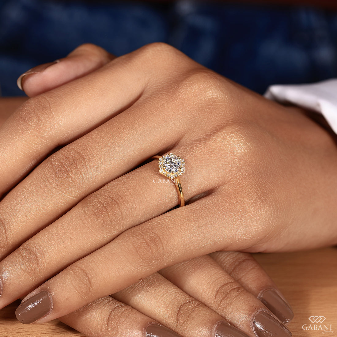 Round cut lab grown diamond engagement ring with hexagon halo, yellow gold band, IGI certified EF color and VS1 clarity.