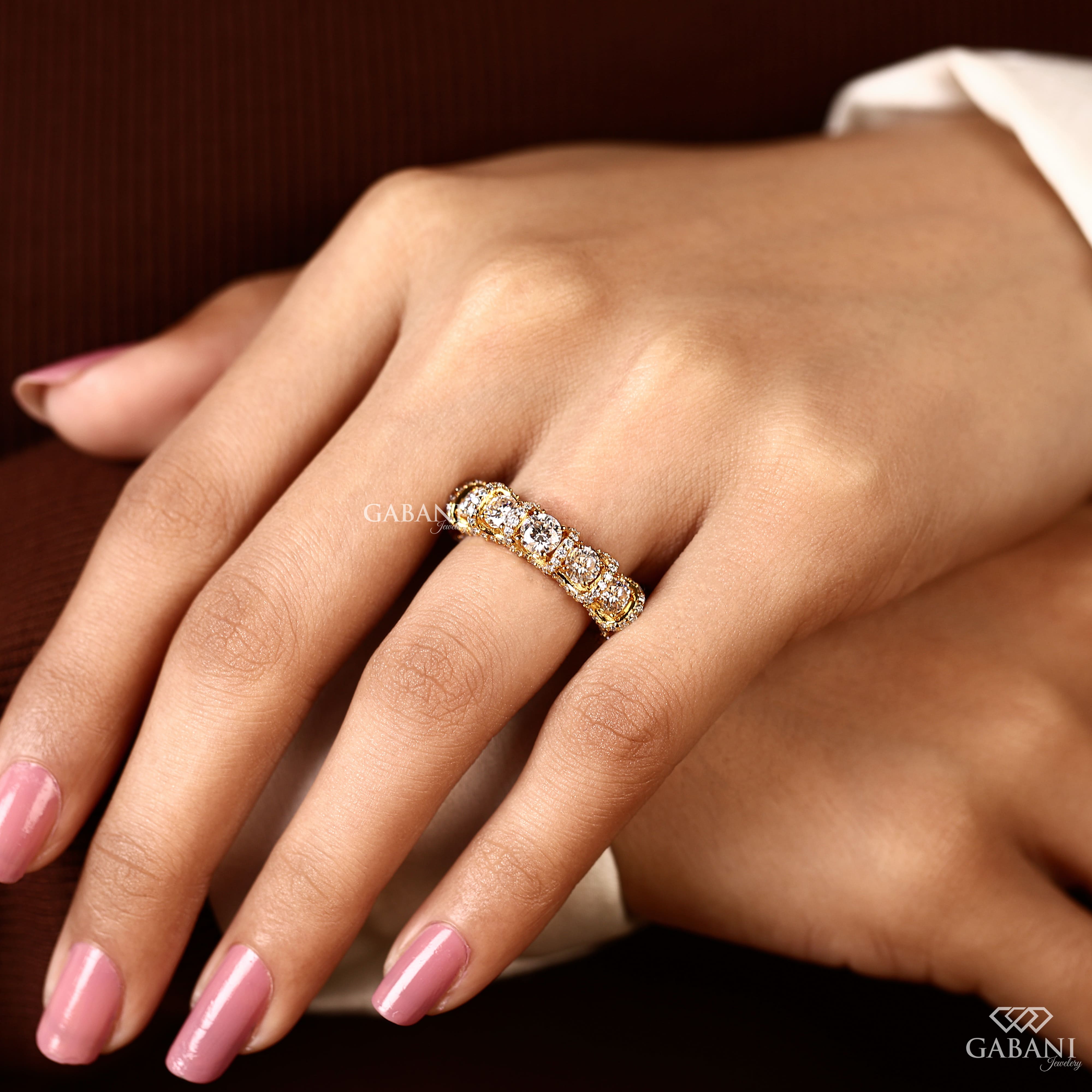 Five stone round cut lab grown diamond wedding band in yellow gold with diamond accent setting, designed for bridal, anniversary and stackable wear.