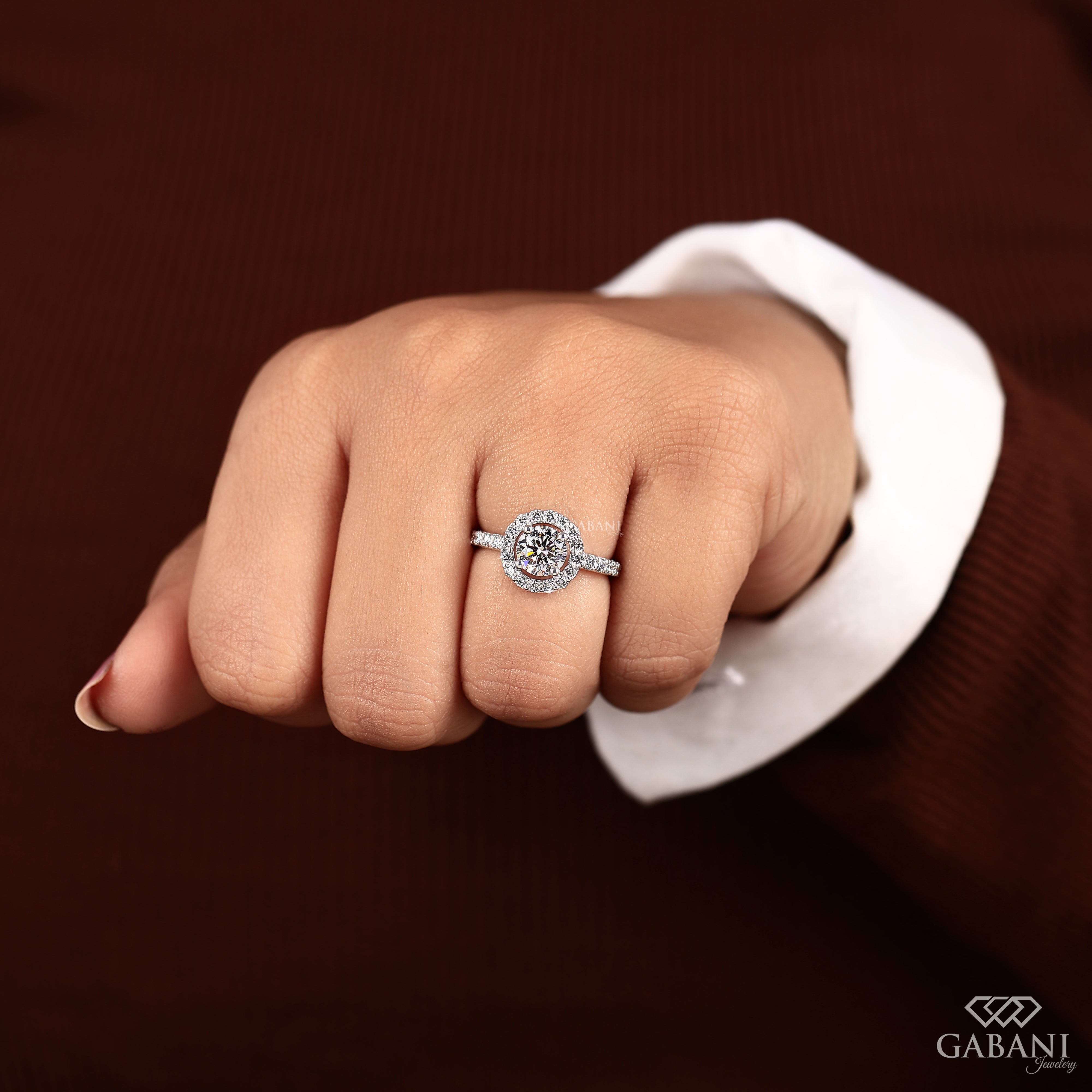 Round cut lab grown diamond halo engagement ring with pave diamond band, yellow gold setting, IGI certified EF color VS1 clarity.