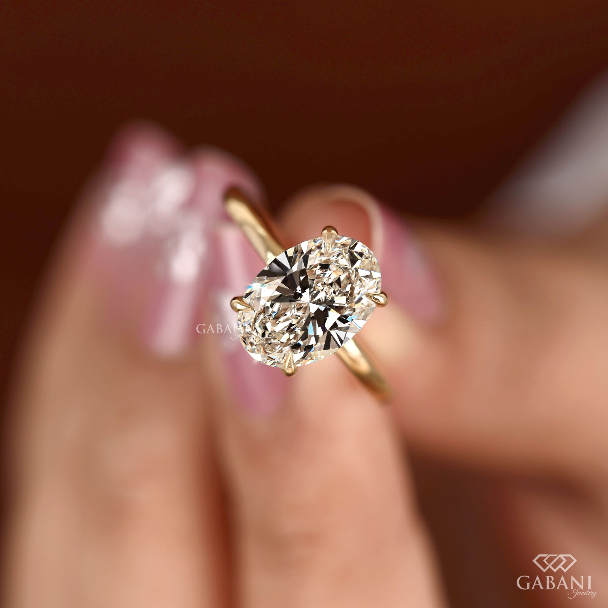 minimal gold solitaire ring with oval lab grown diamond
