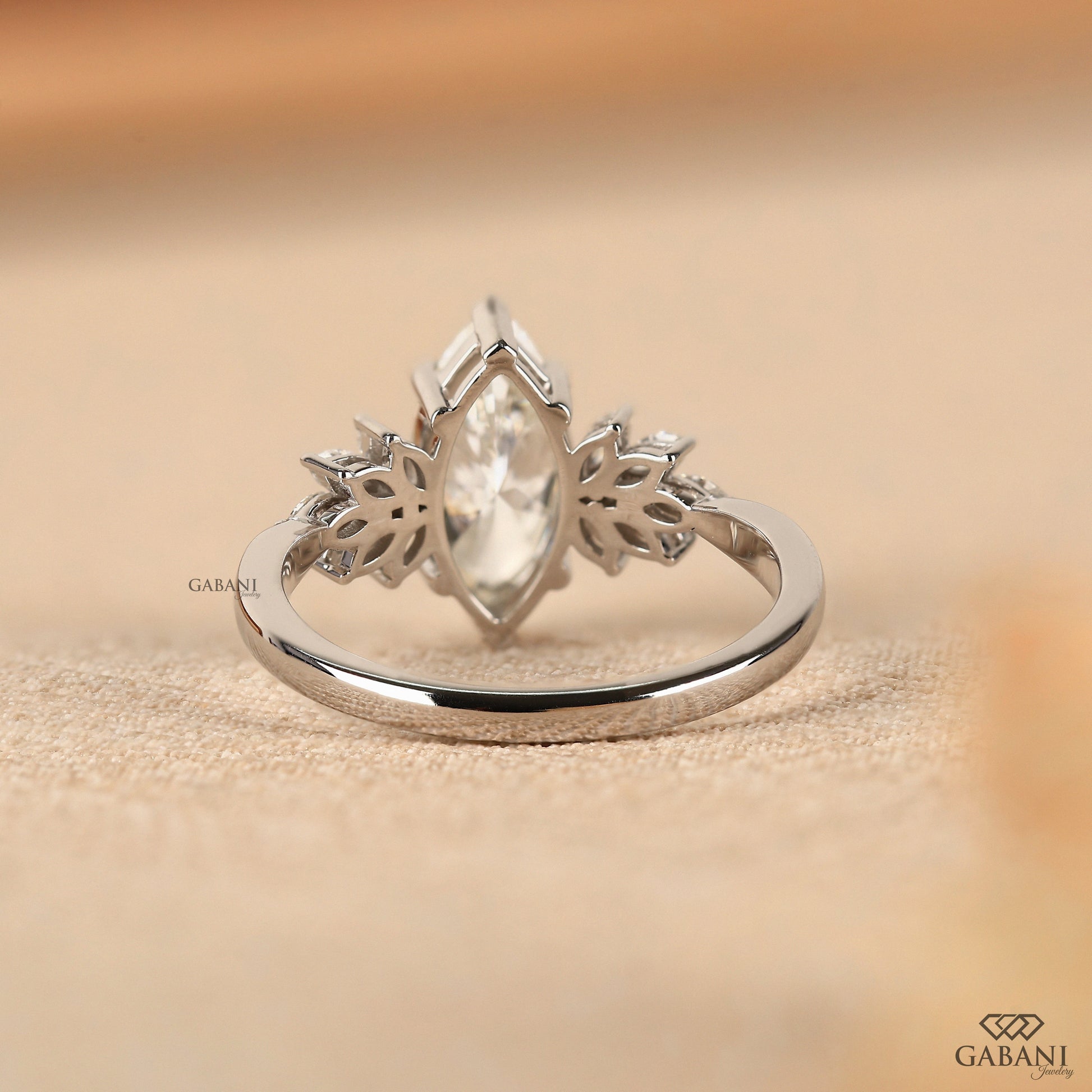 Minimal white gold ring with marquise cut lab grown diamond and timeless silhouette