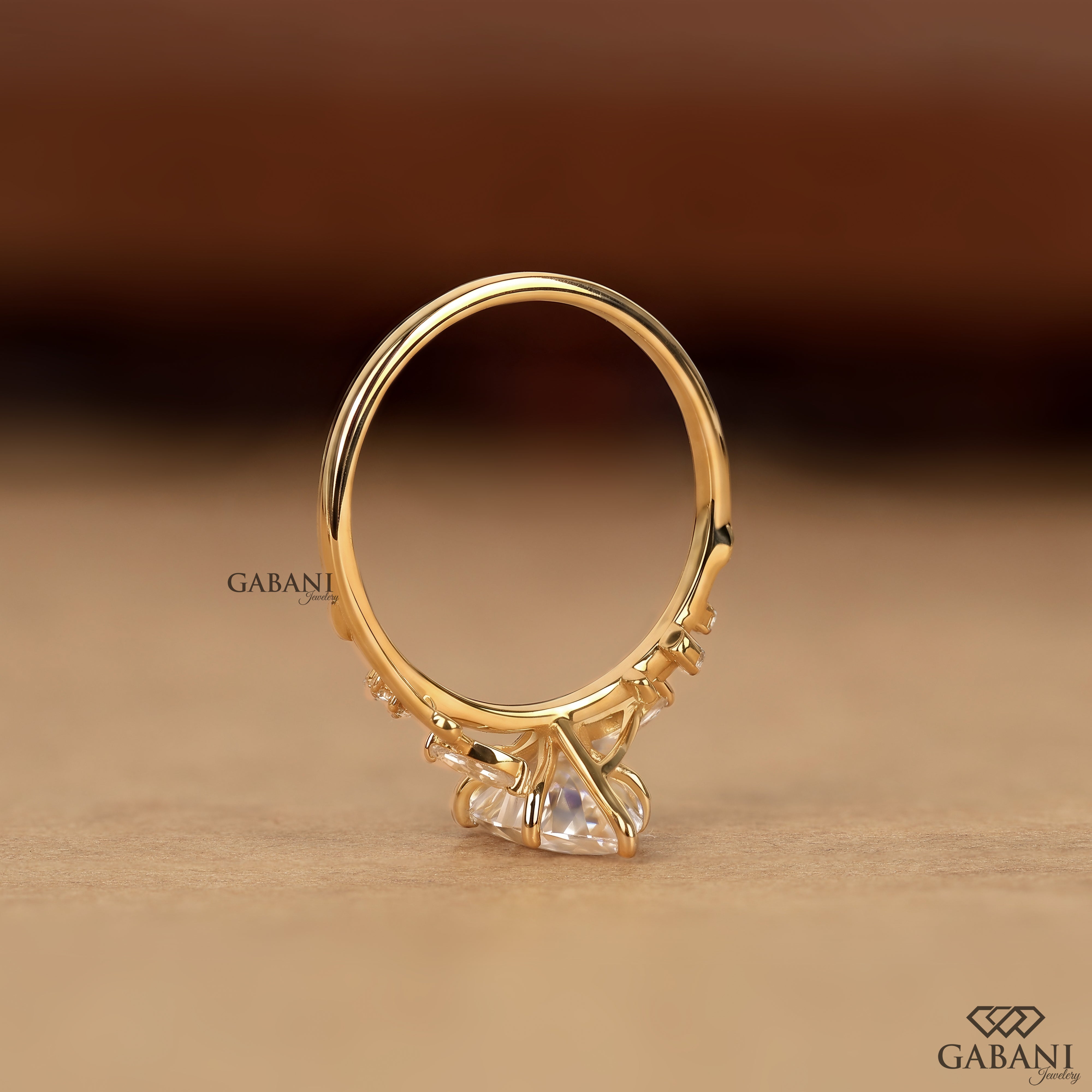 Lab grown diamond engagement ring with marquise center and nature inspired band