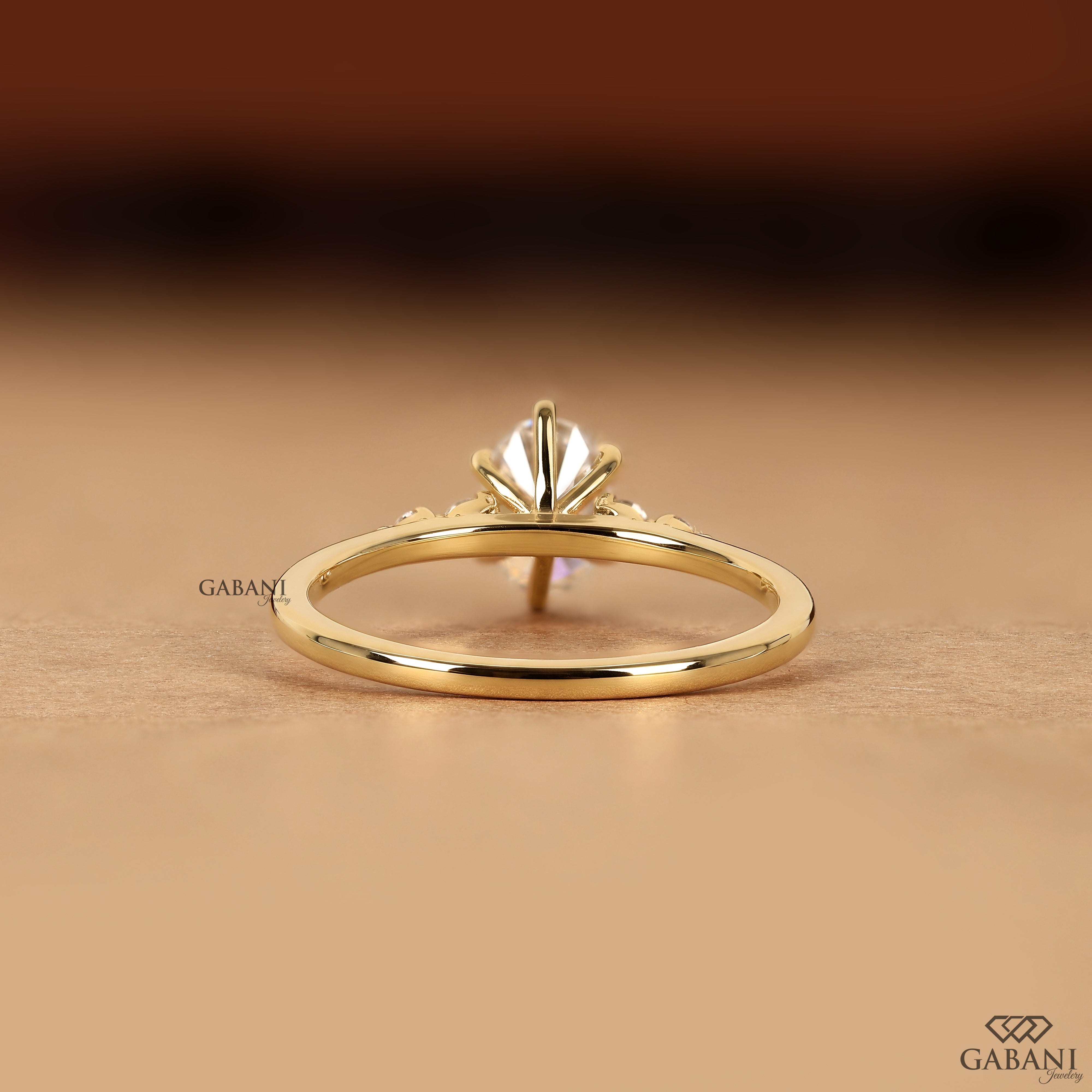 Lab grown diamond engagement ring with oval center and round diamonds