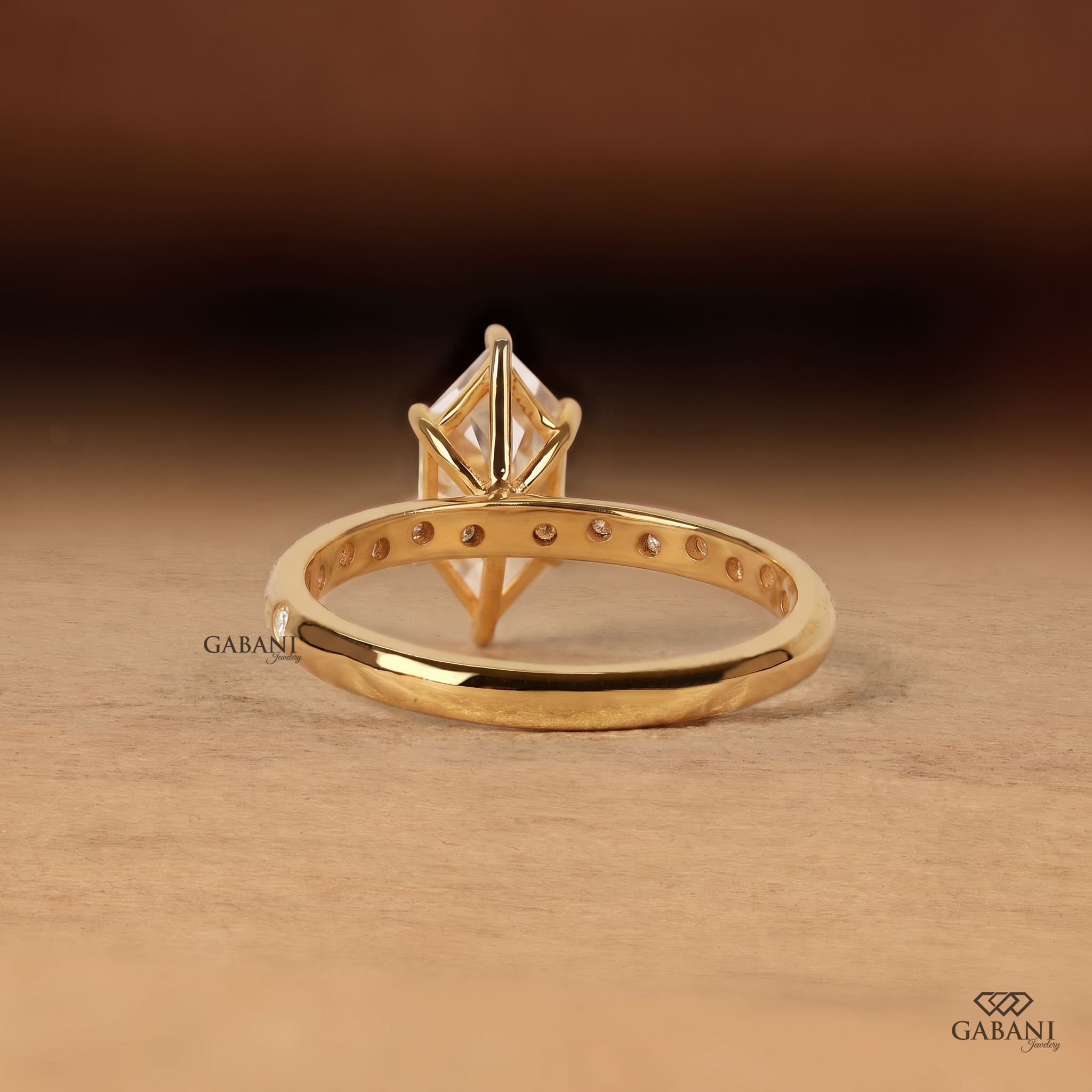 Marquise cut lab grown diamond engagement ring with sparkling round diamond accent band and elegant prong setting