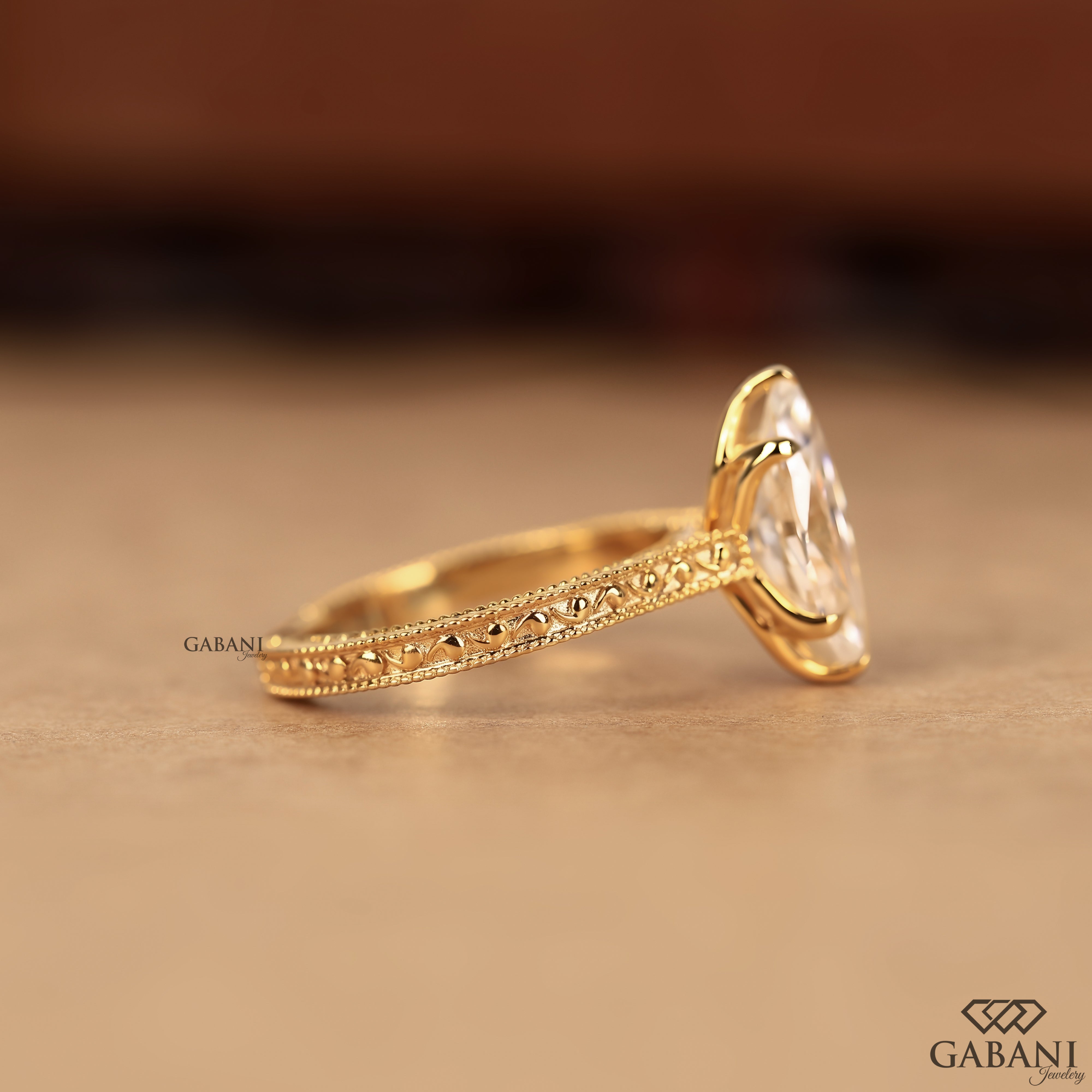 Marquise cut lab grown diamond engagement ring with antique style band