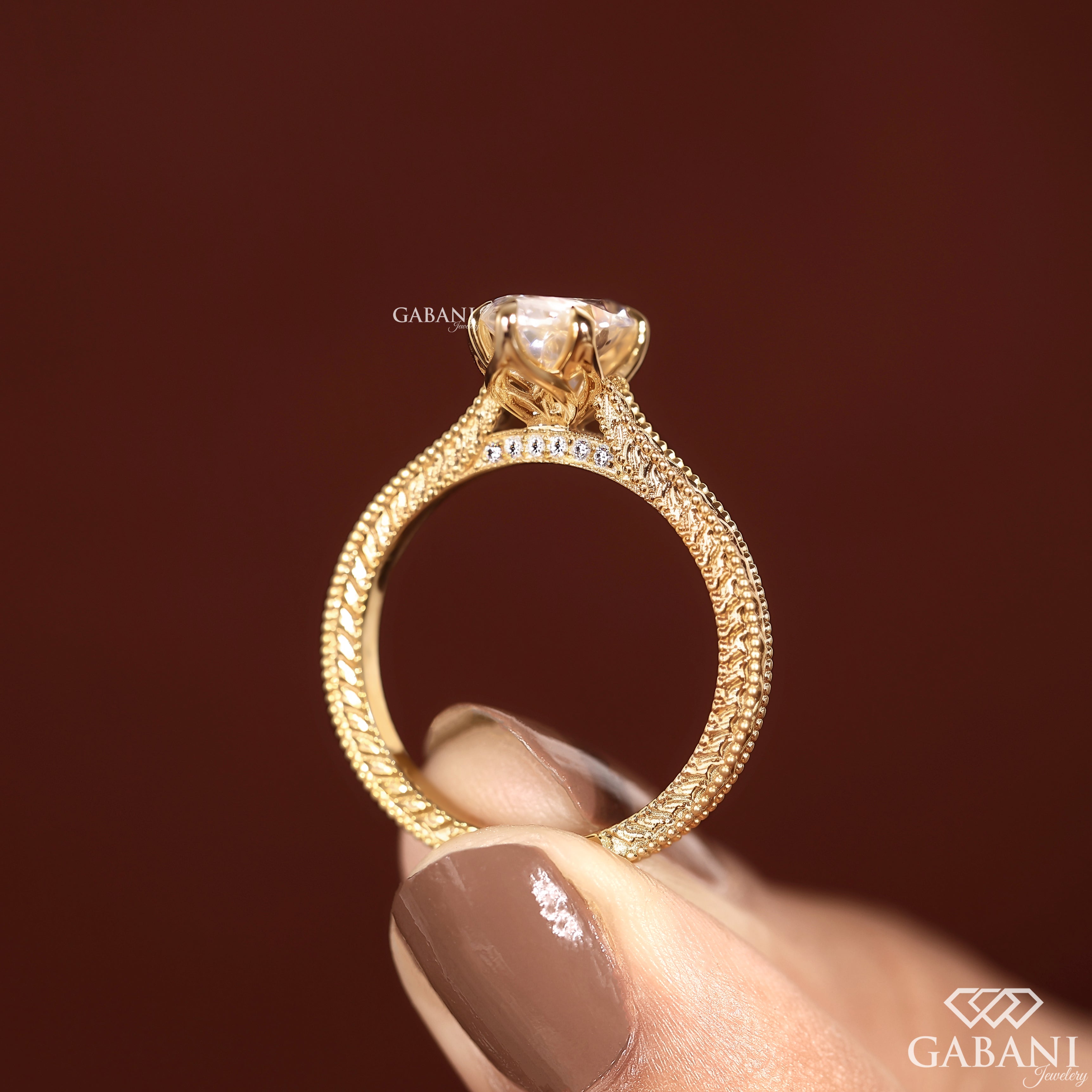Marquise cut lab grown diamond ring with detailed gold band