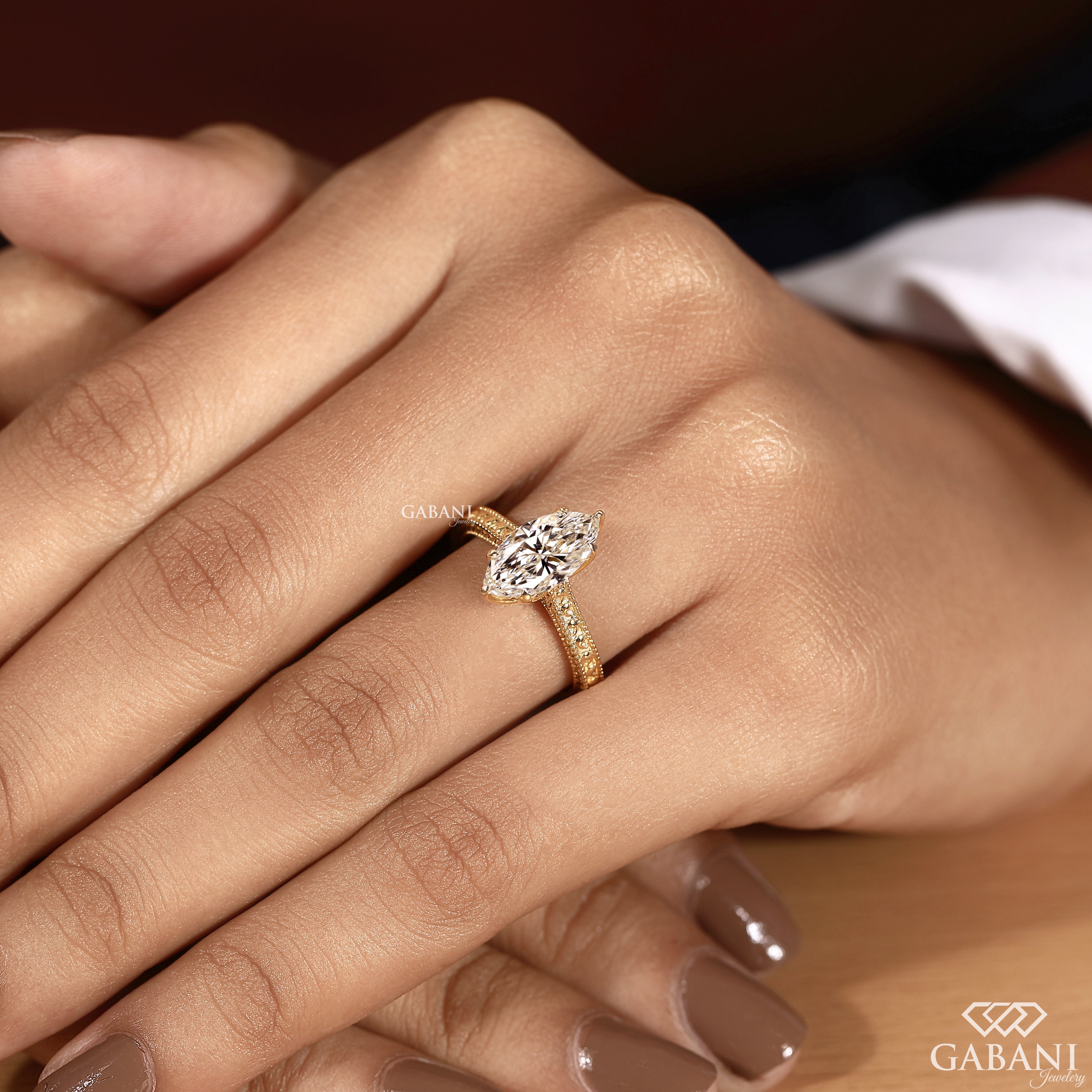 Marquise cut lab grown diamond ring with ornate vintage band