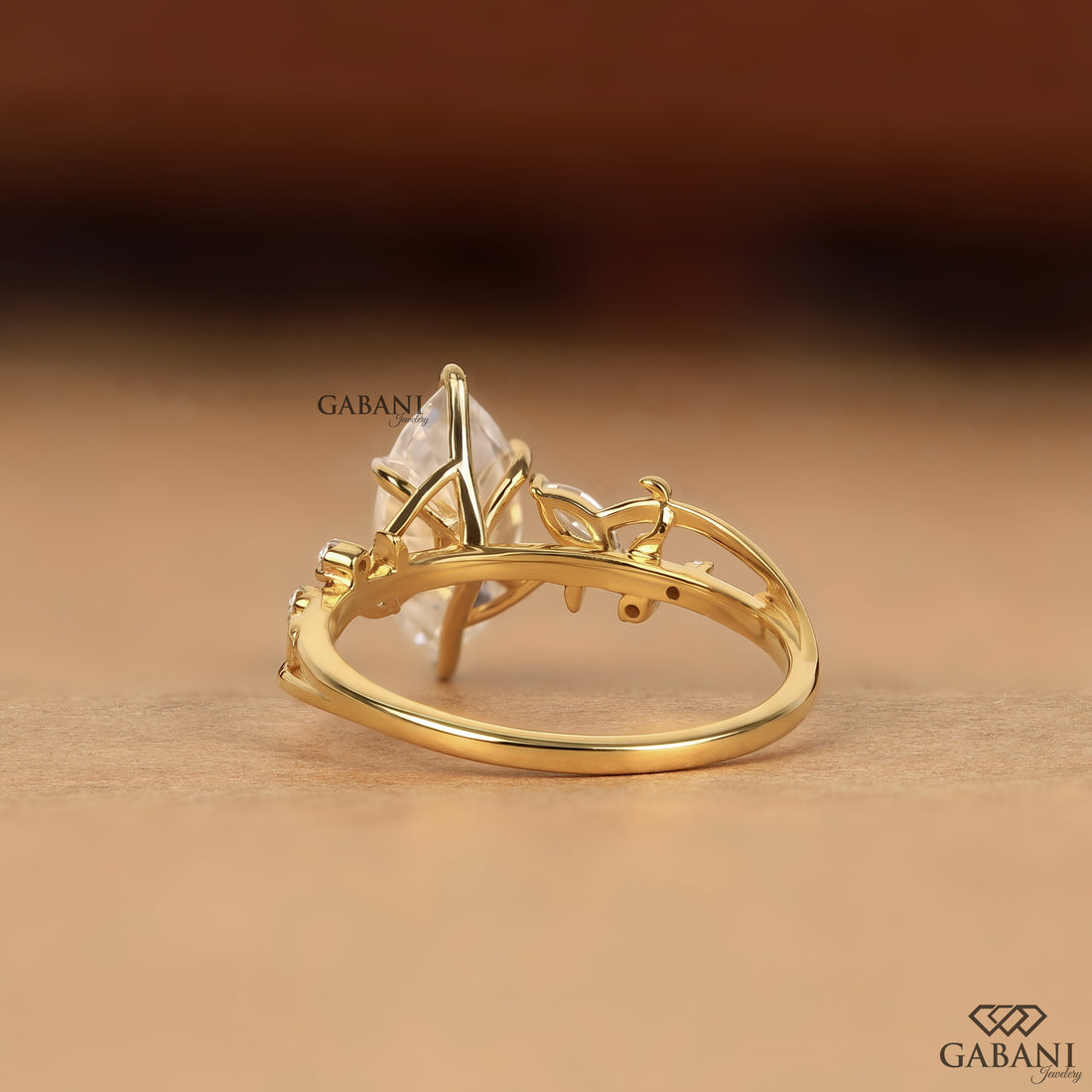 Marquise cut lab grown diamond ring with vine and leaf detailing