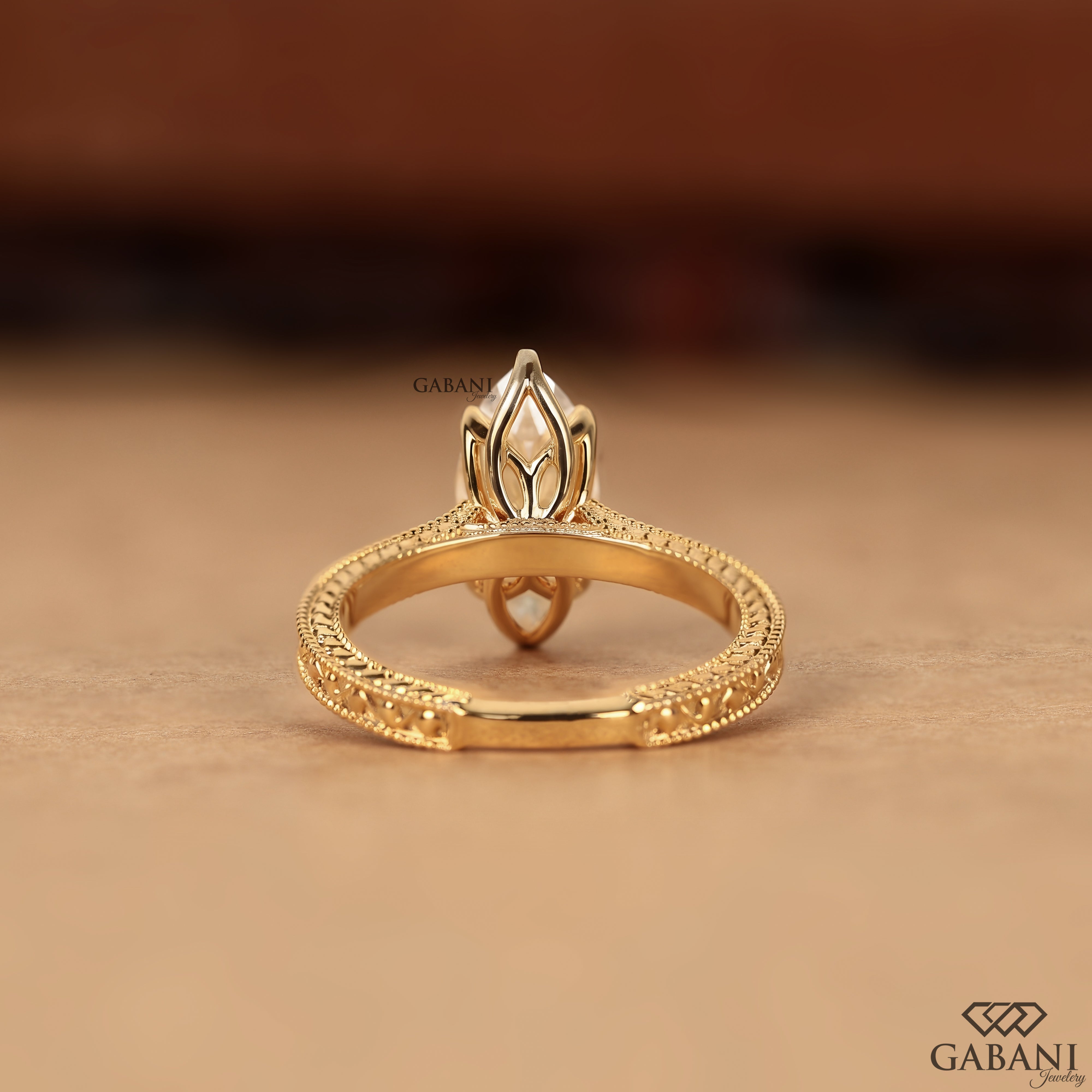 Marquise lab grown diamond ring with milgrain inspired band details