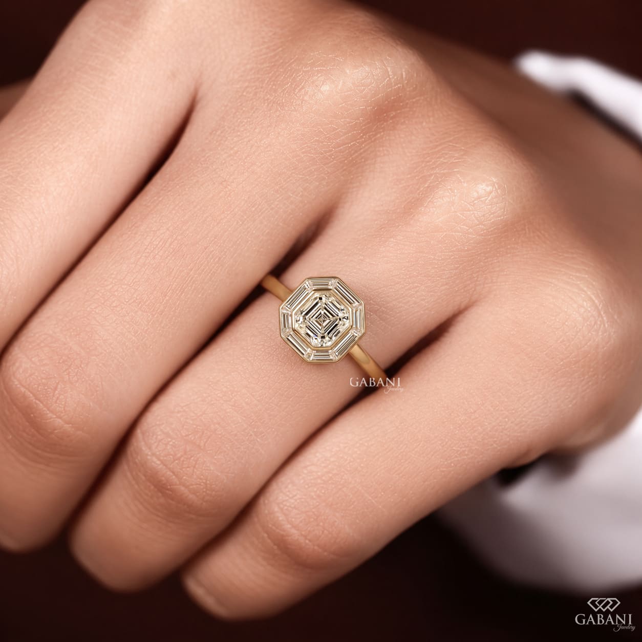 Asscher cut lab grown diamond engagement ring with baguette diamond halo in 18K yellow gold, featuring a vintage Art Deco design.