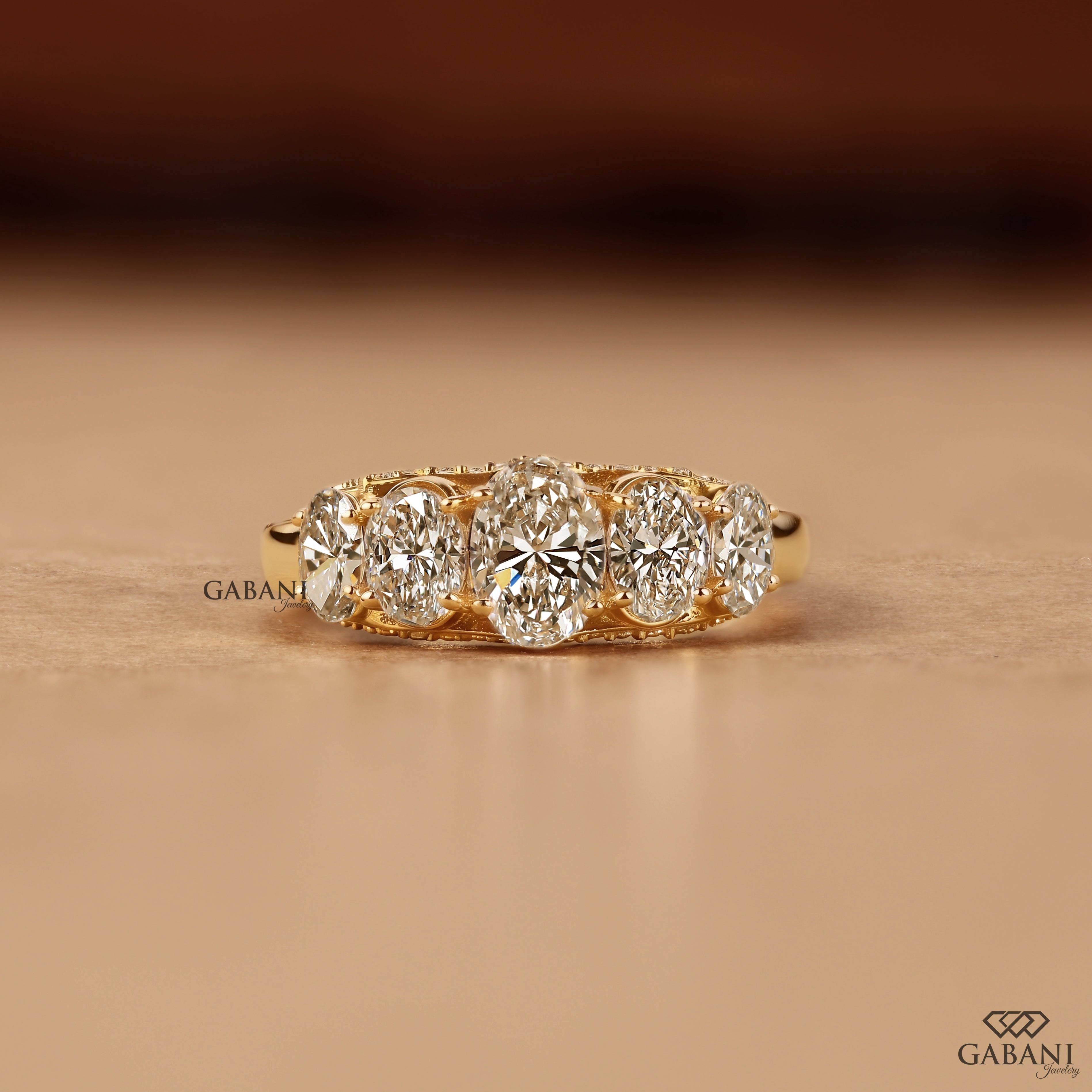 Oval cut lab grown diamond wedding band with graduated diamonds