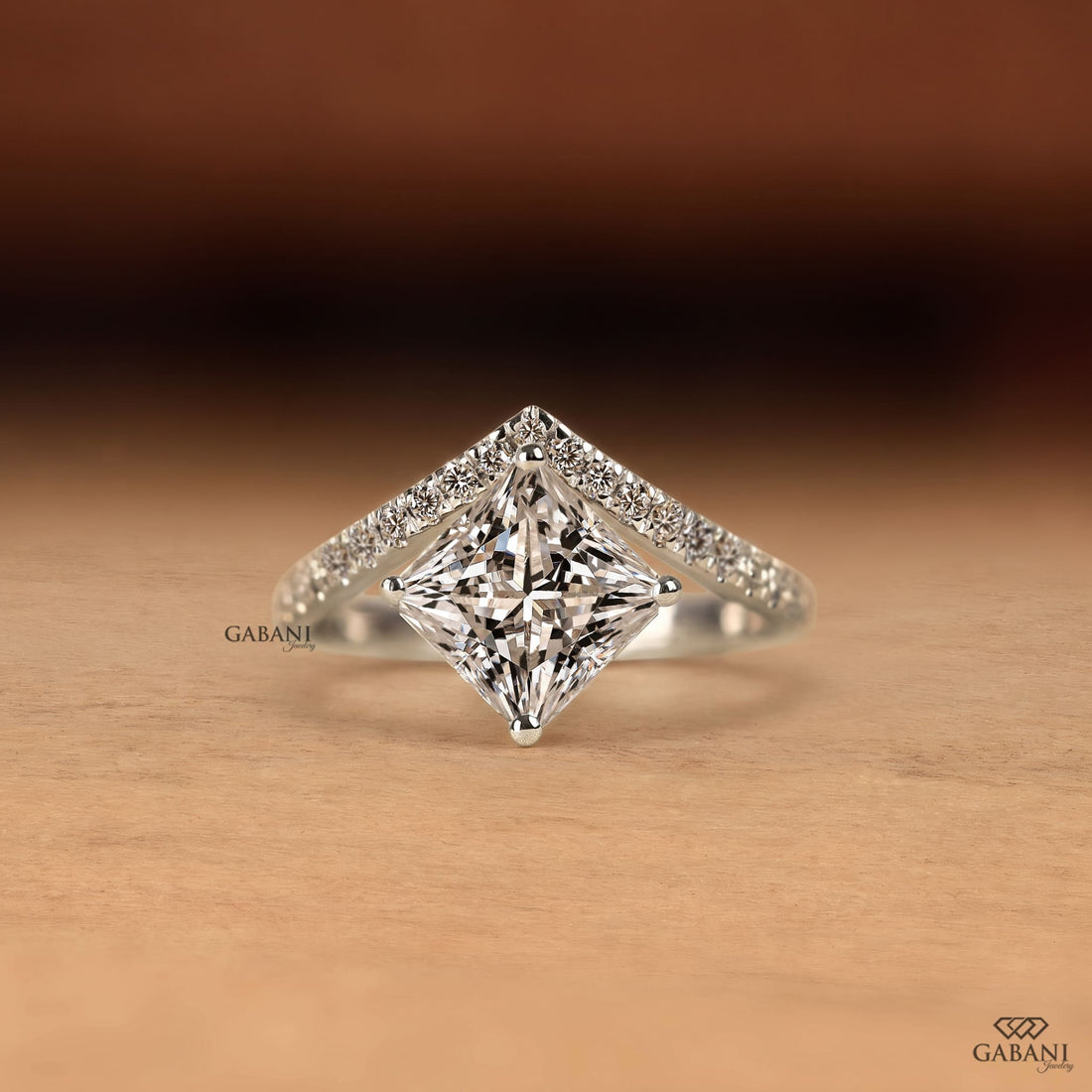 Princess cut lab grown diamond engagement ring in white gold with a kite set center stone and round pave diamond accents on a cathedral style band, designed for engagement, bridal, proposal, or anniversary wear.