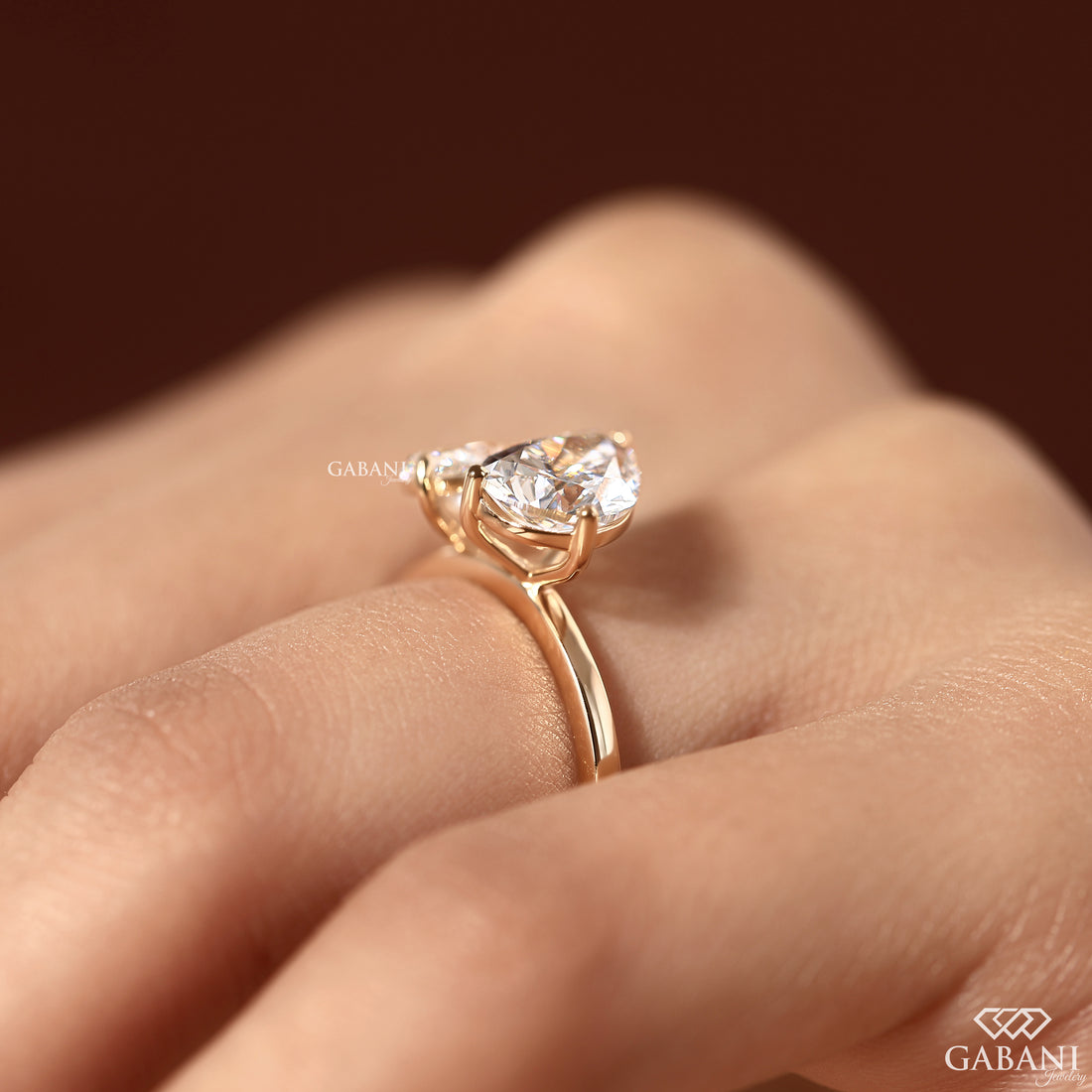 Pear cut lab grown diamond bypass style Toi et Moi ring