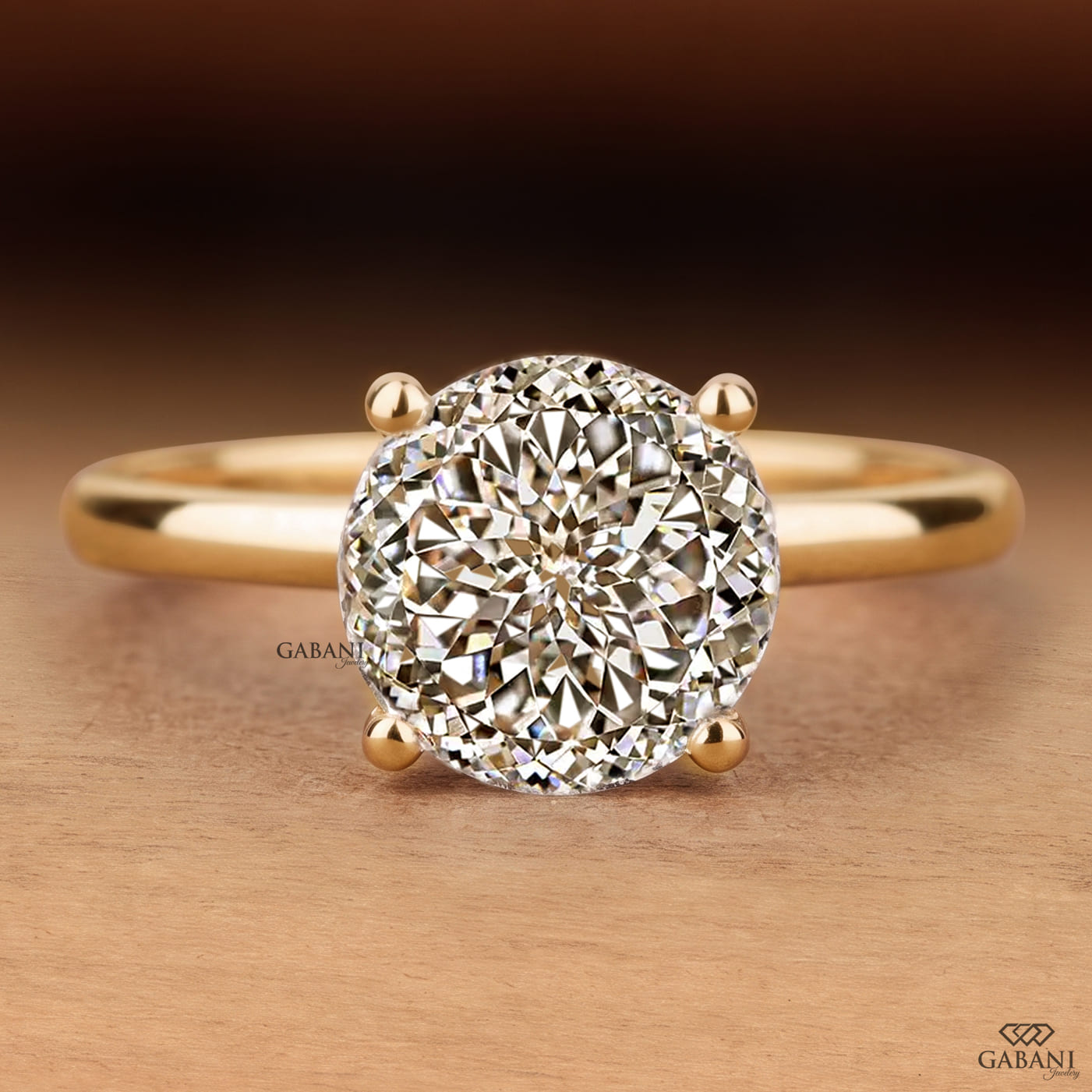 Round cut lab grown diamond solitaire engagement ring with four-prong setting and polished yellow gold band.