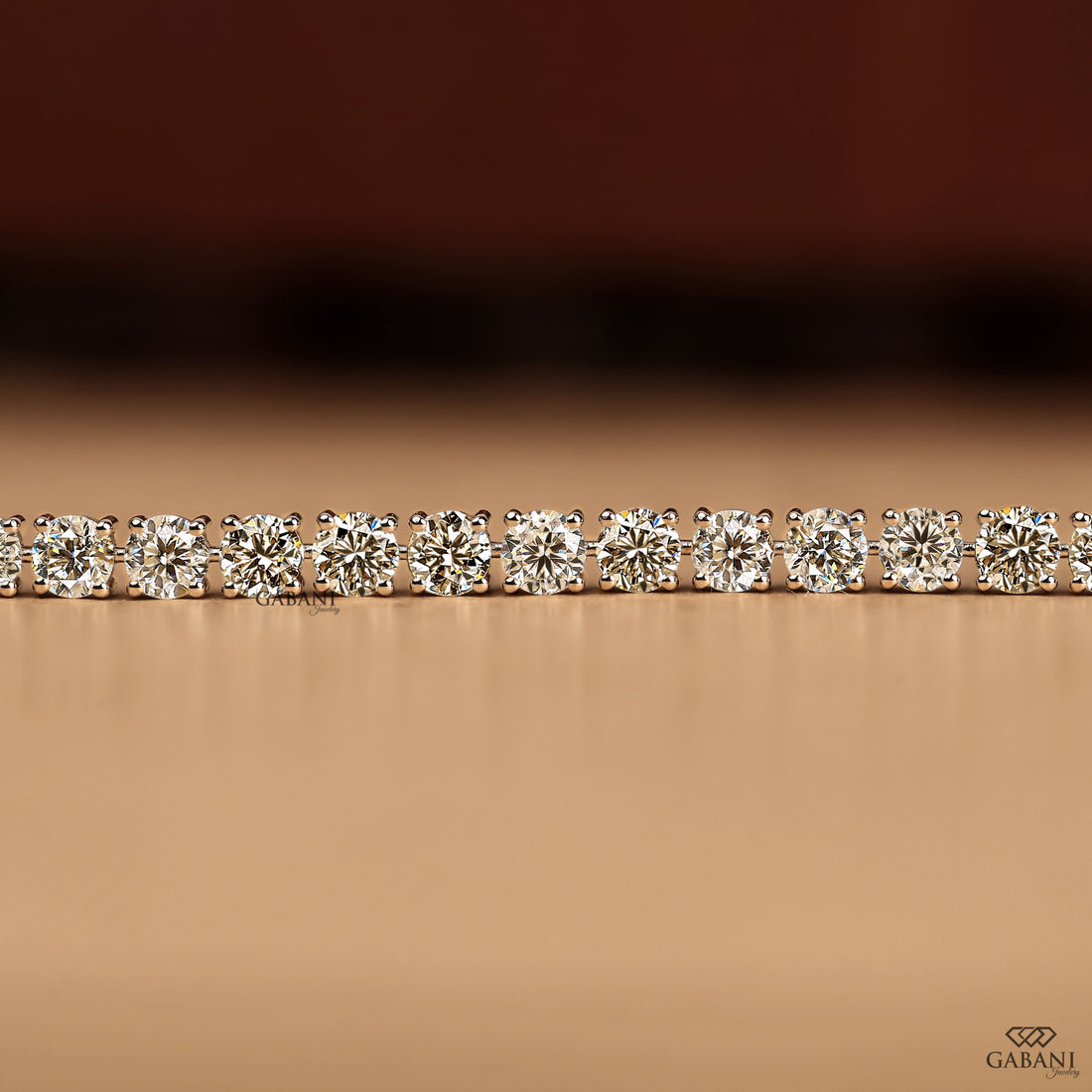 Round cut lab grown diamond tennis bracelet with EF color VS1 clarity diamonds in classic four prong settings and secure clasp.