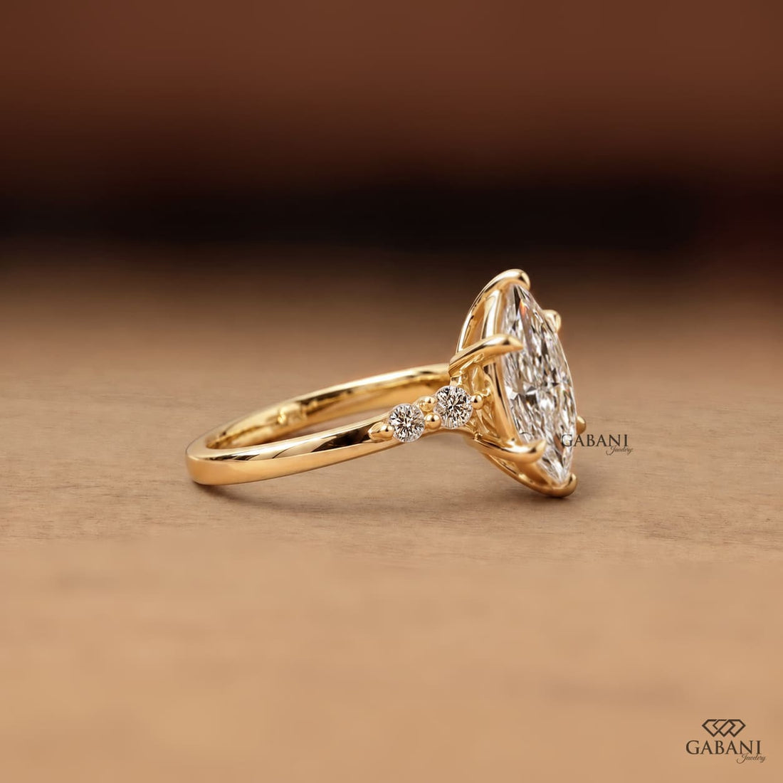 Marquise Cut Lab Grown Diamond Engagement Ring with Round Side Stones