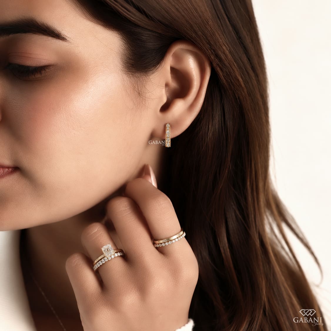 Round cut diamond milgrain hoop earrings in yellow gold with graduated diamonds