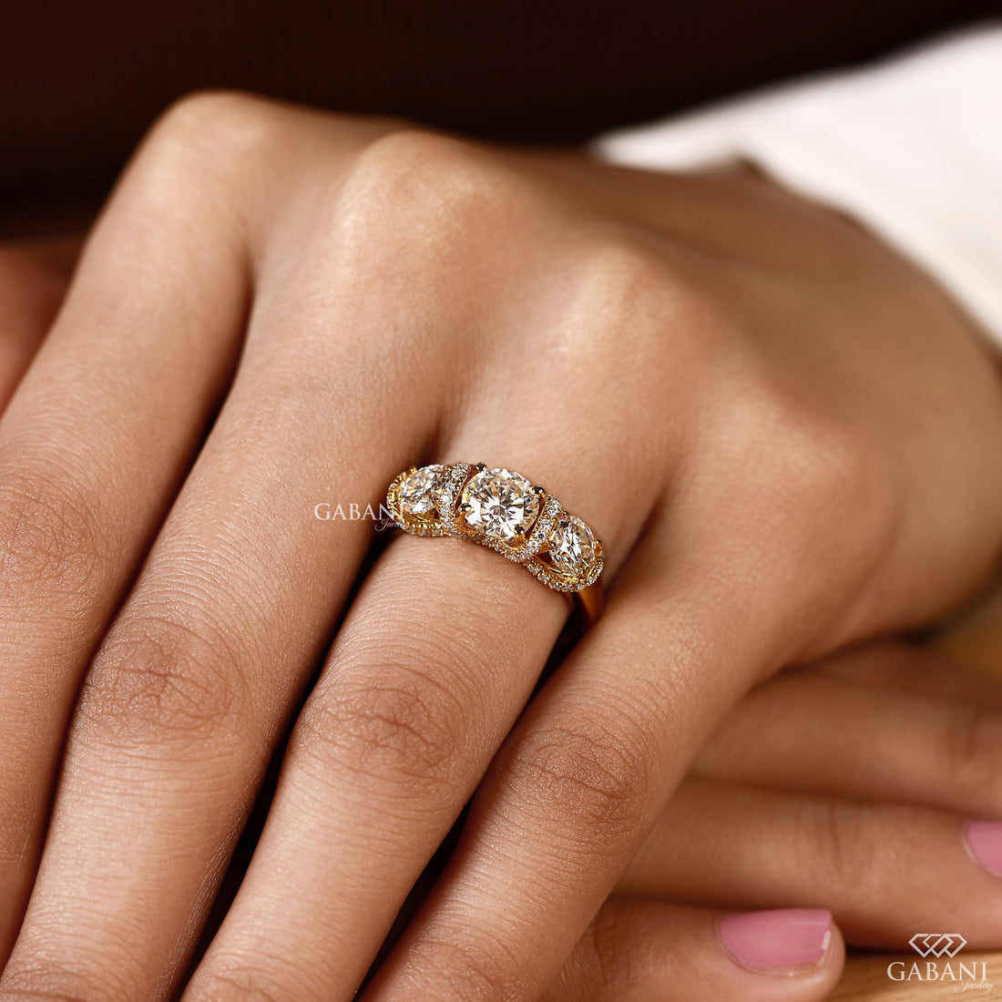 1.5 to 2 carat lab grown diamond engagement ring with cushion and pear cuts