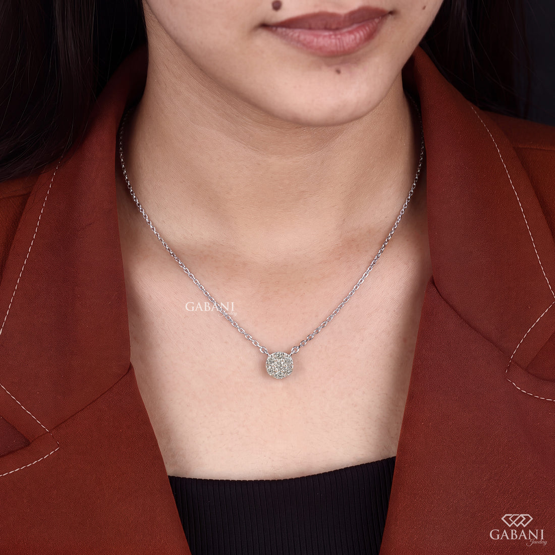 Seven stone round cut lab grown diamond floral cluster necklace in 18K white gold with a delicate cable chain and prong setting.